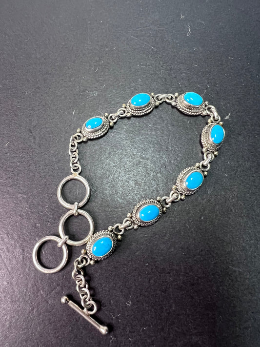 Turquoise and sterling silver link bracelet with toggle clasp