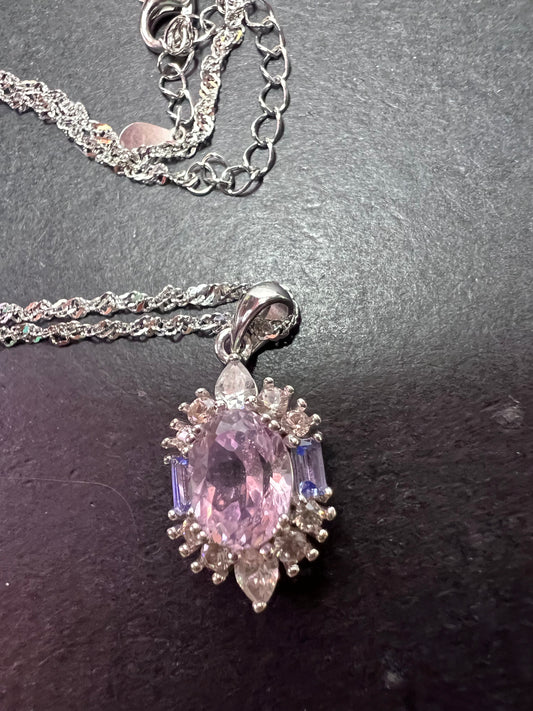 2.11ct Kunzite, 0.18ctw Tanzanite And 0.87ctw White Zircon Rhodium Over Silver halo Pendant With Chain