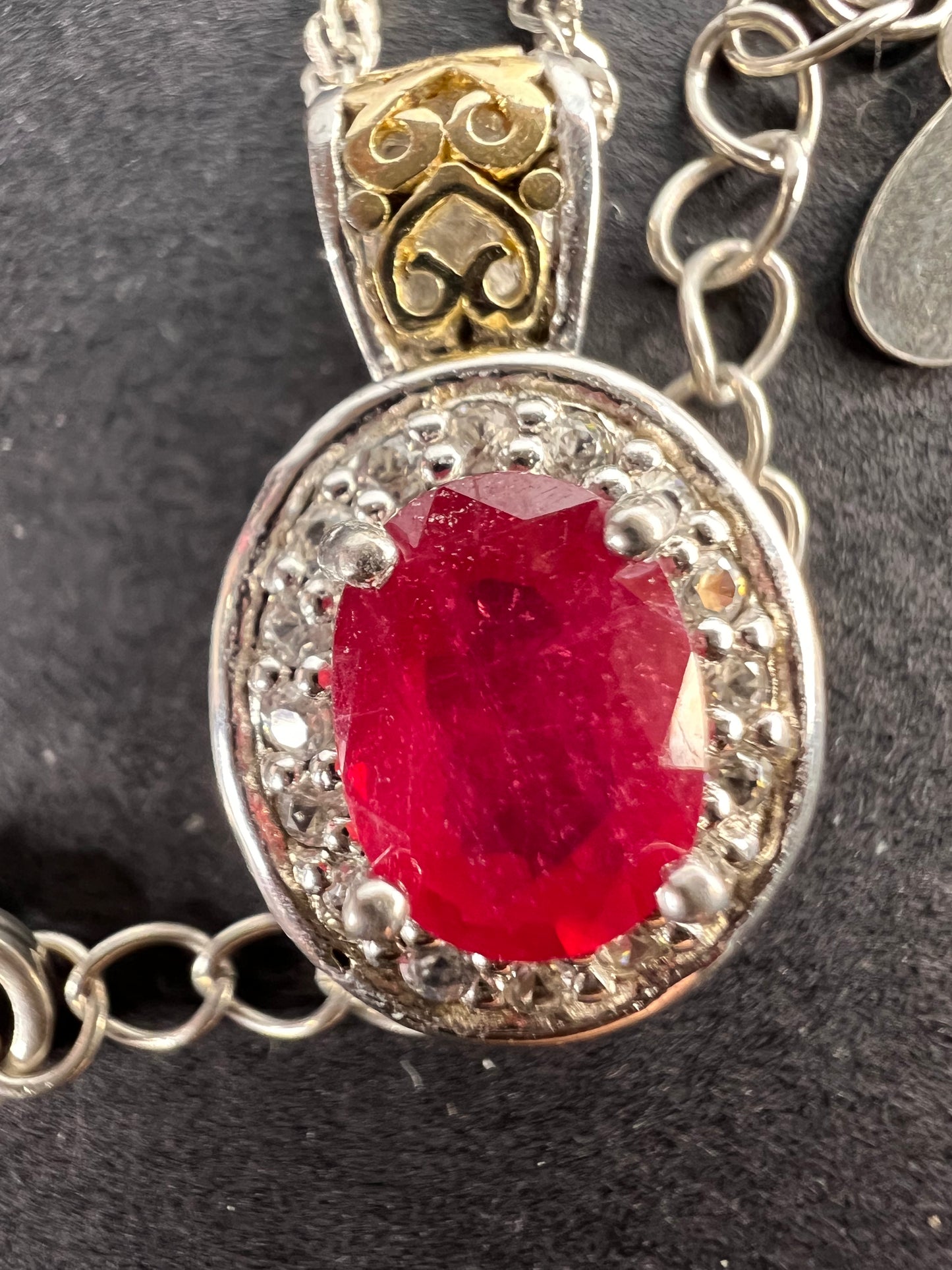 Ruby and zircon two toned halo pendant and chain necklace in sterling silver