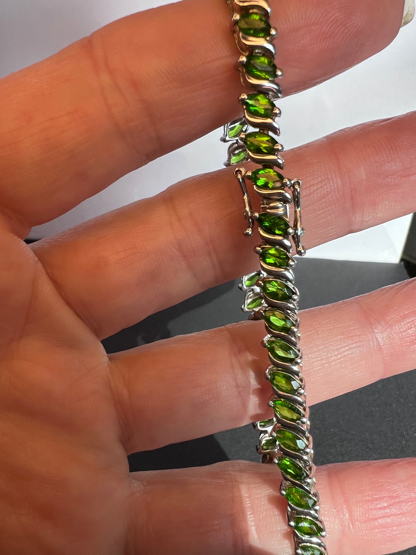 Chrome diopside tennis bracelet in rhodium over sterling silver