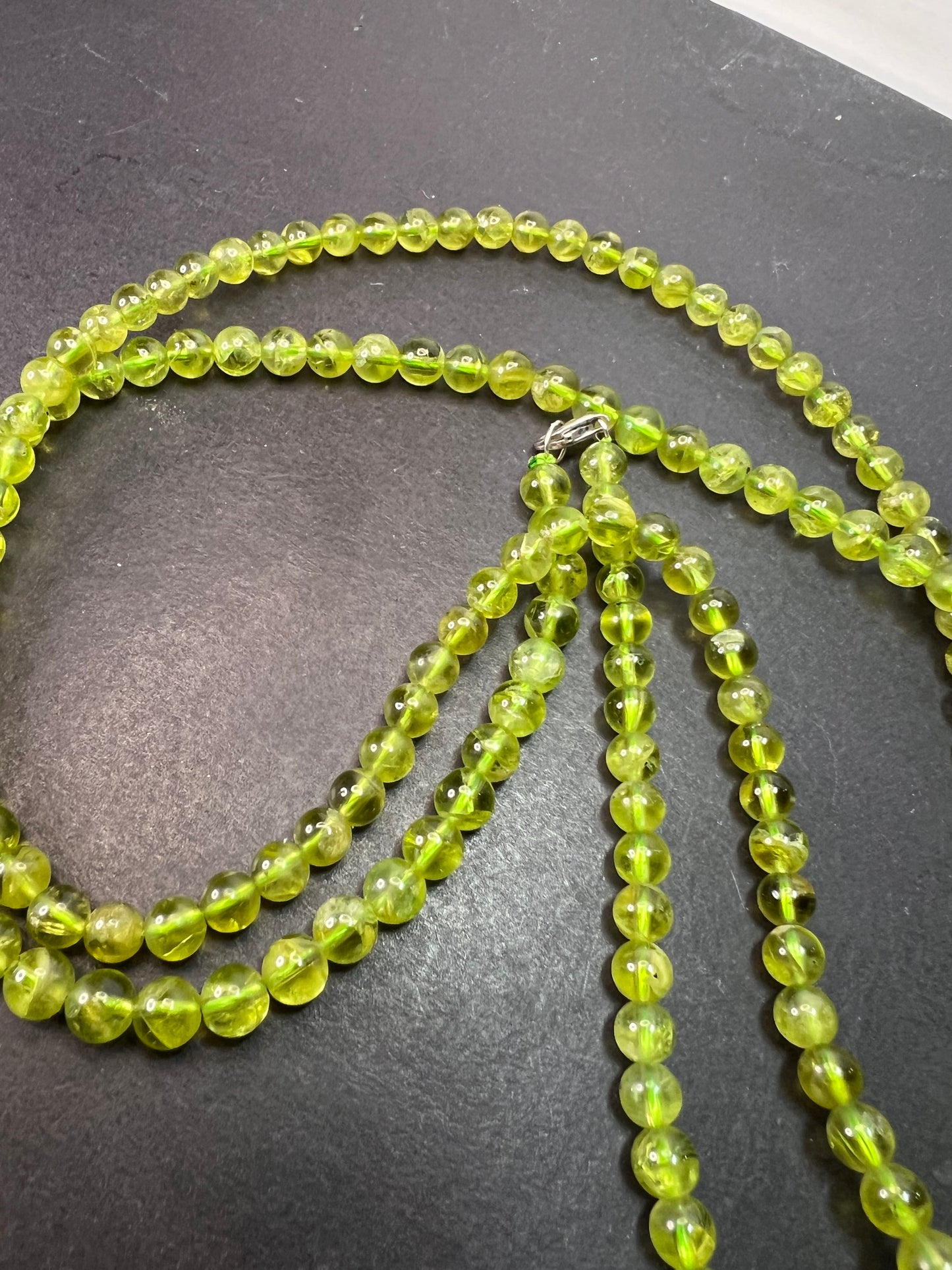 6mm high grade peridot beaded 36 inch necklace with sterling silver clasp