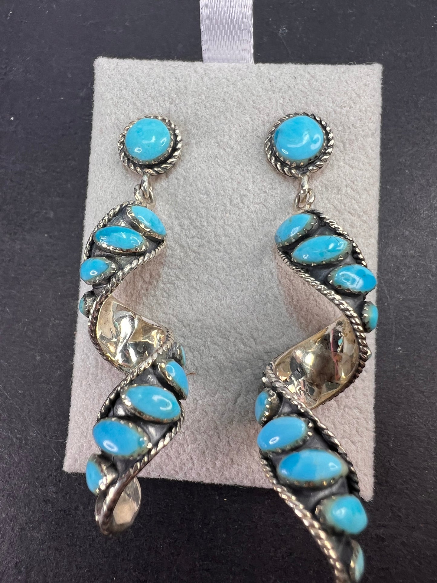 Santa Fe style Kingman turquoise swirl twisted drop sterling silver earrings