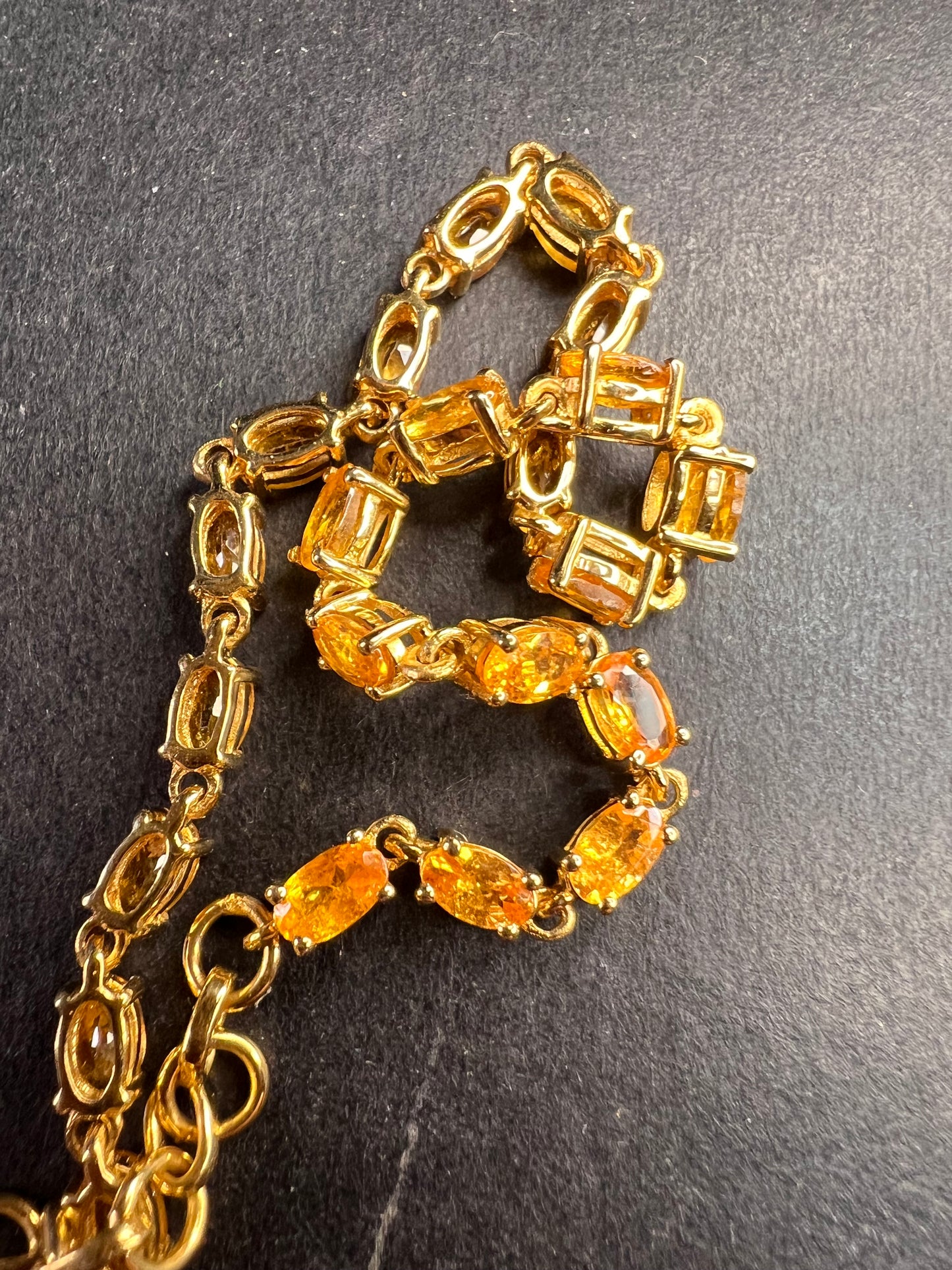 Yellow spessartine garnet tennis bracelet in gold over sterling silver