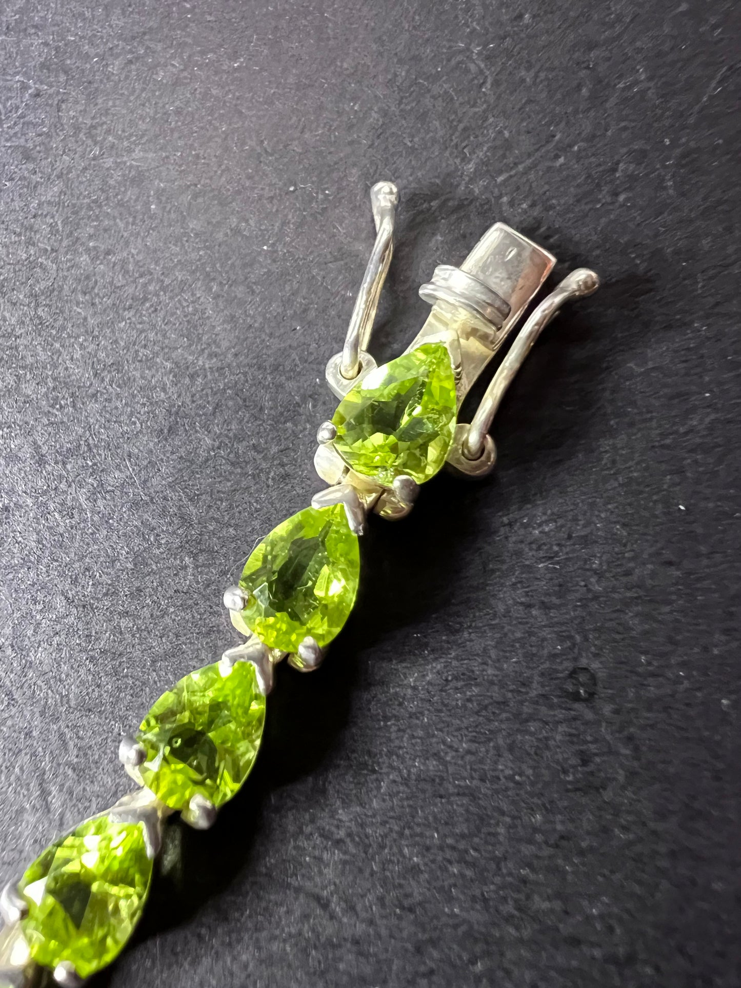 Peridot and sterling silver tennis bracelet