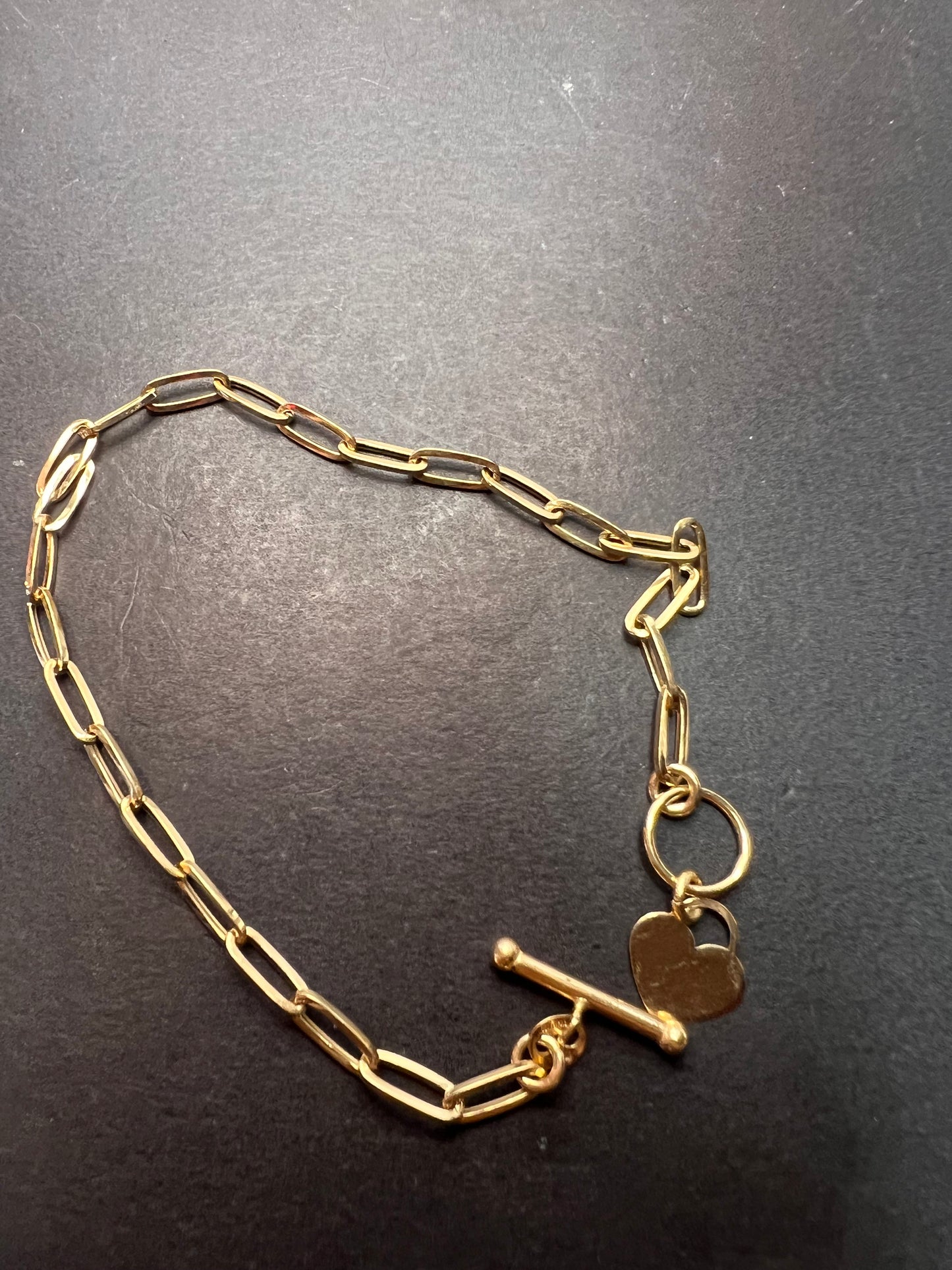 Italian 10k yellow gold paper clip heart bracelet with heart toggle