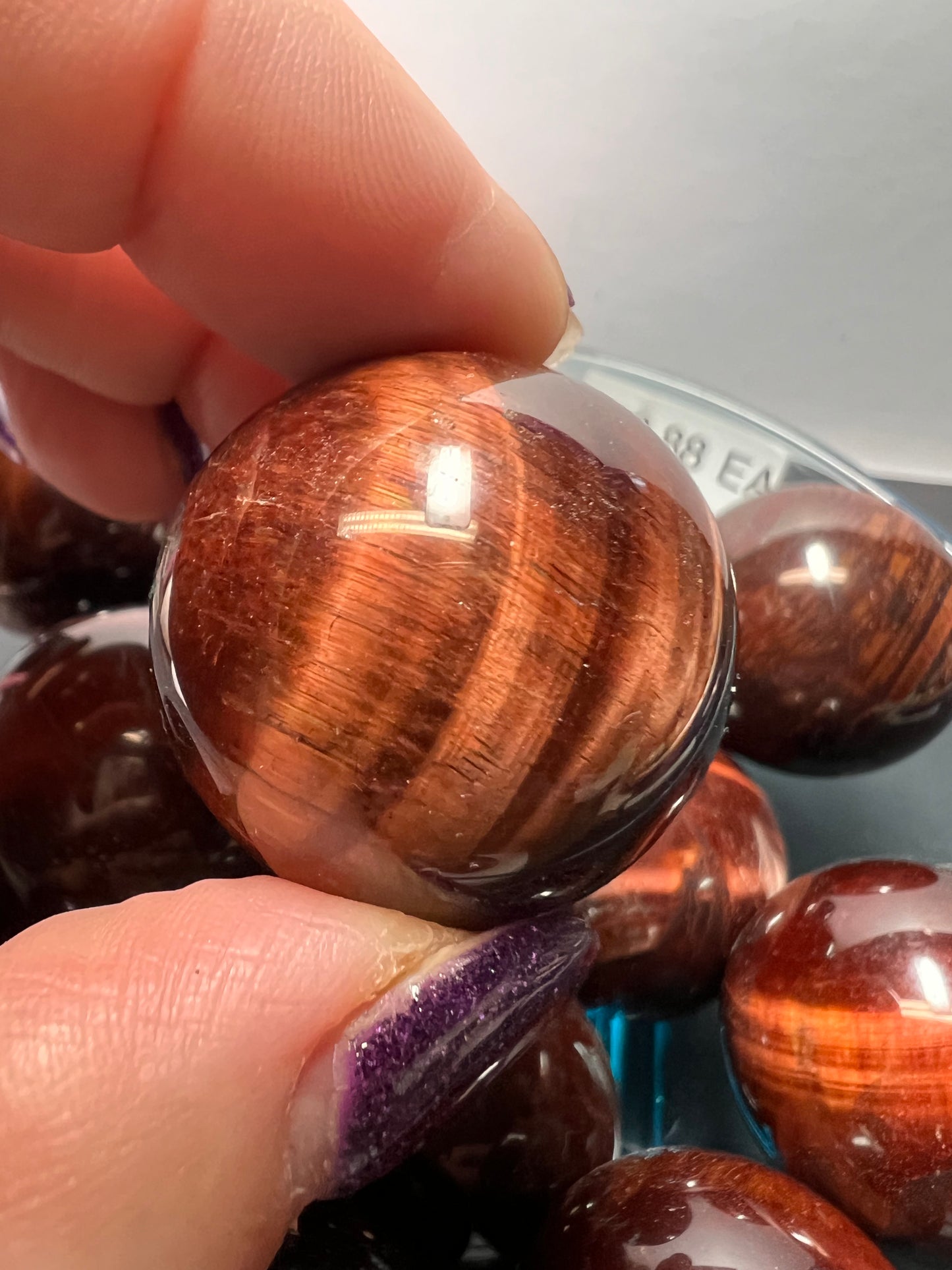 Red tigers eye sphere