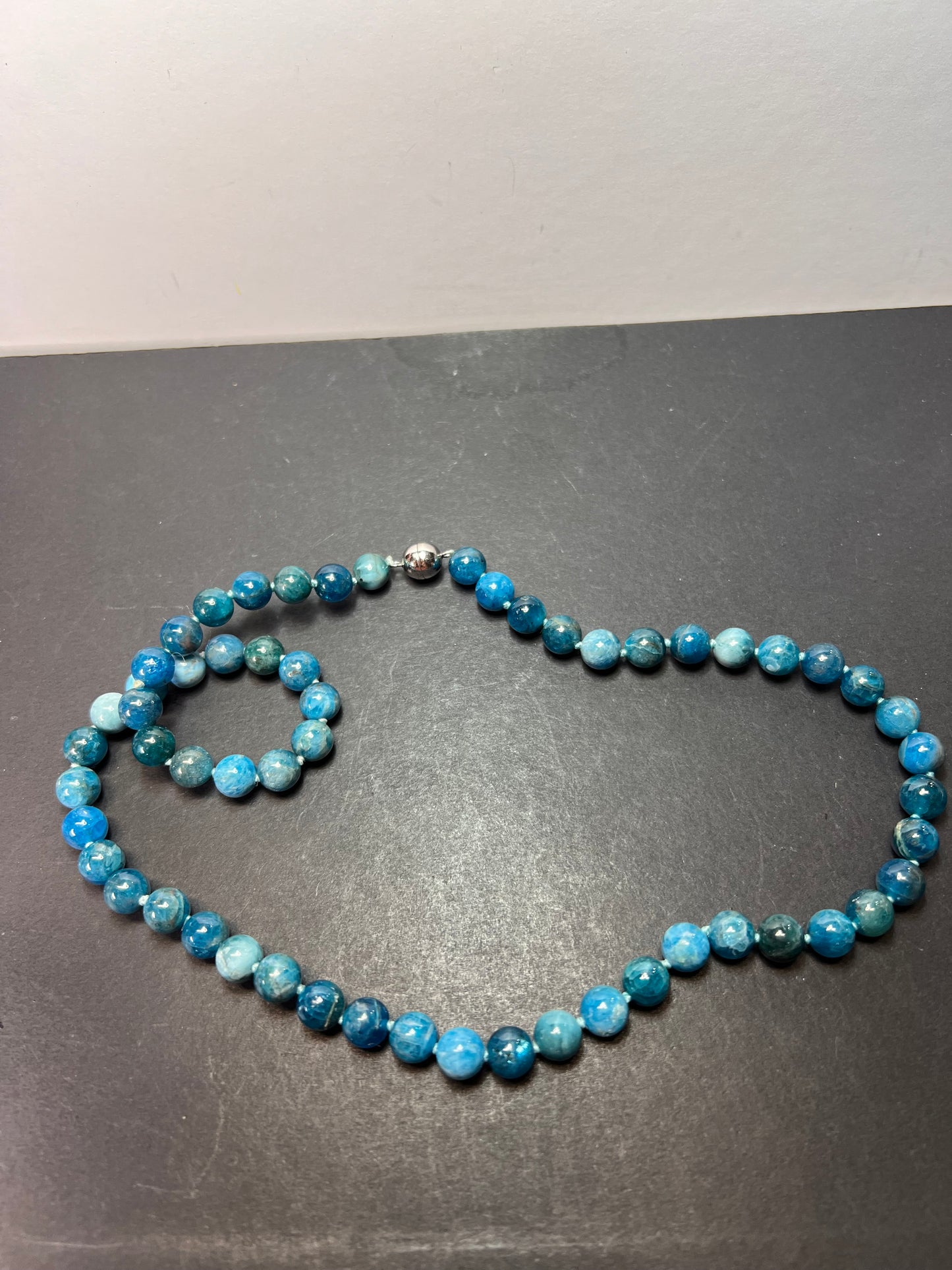 Blue apatite 8 mm knotted necklace