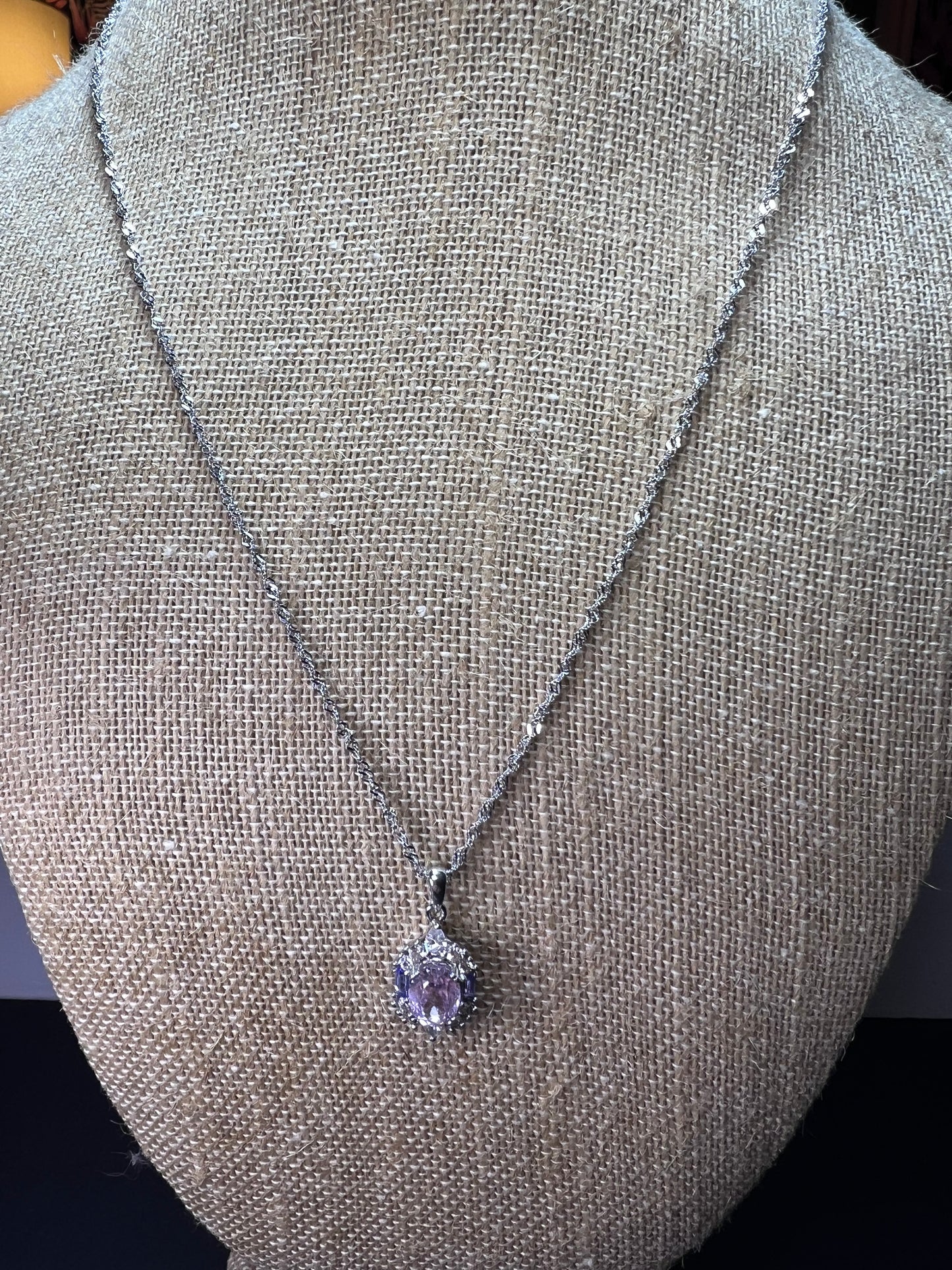 2.11ct Kunzite, 0.18ctw Tanzanite And 0.87ctw White Zircon Rhodium Over Silver halo Pendant With Chain