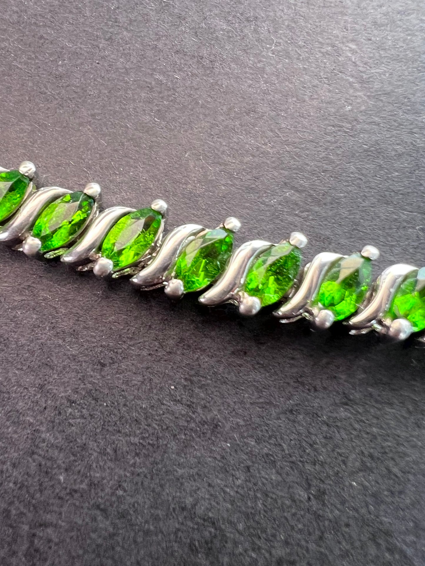 Chrome diopside tennis bracelet in rhodium over sterling silver