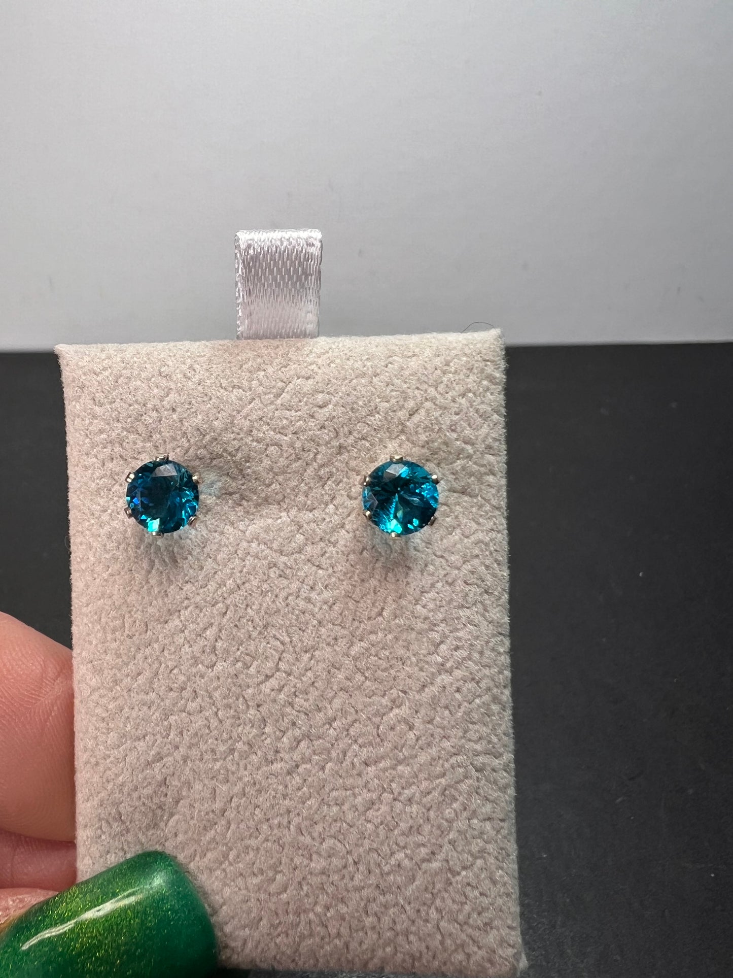 Blue stone stud earrings in sterling silver