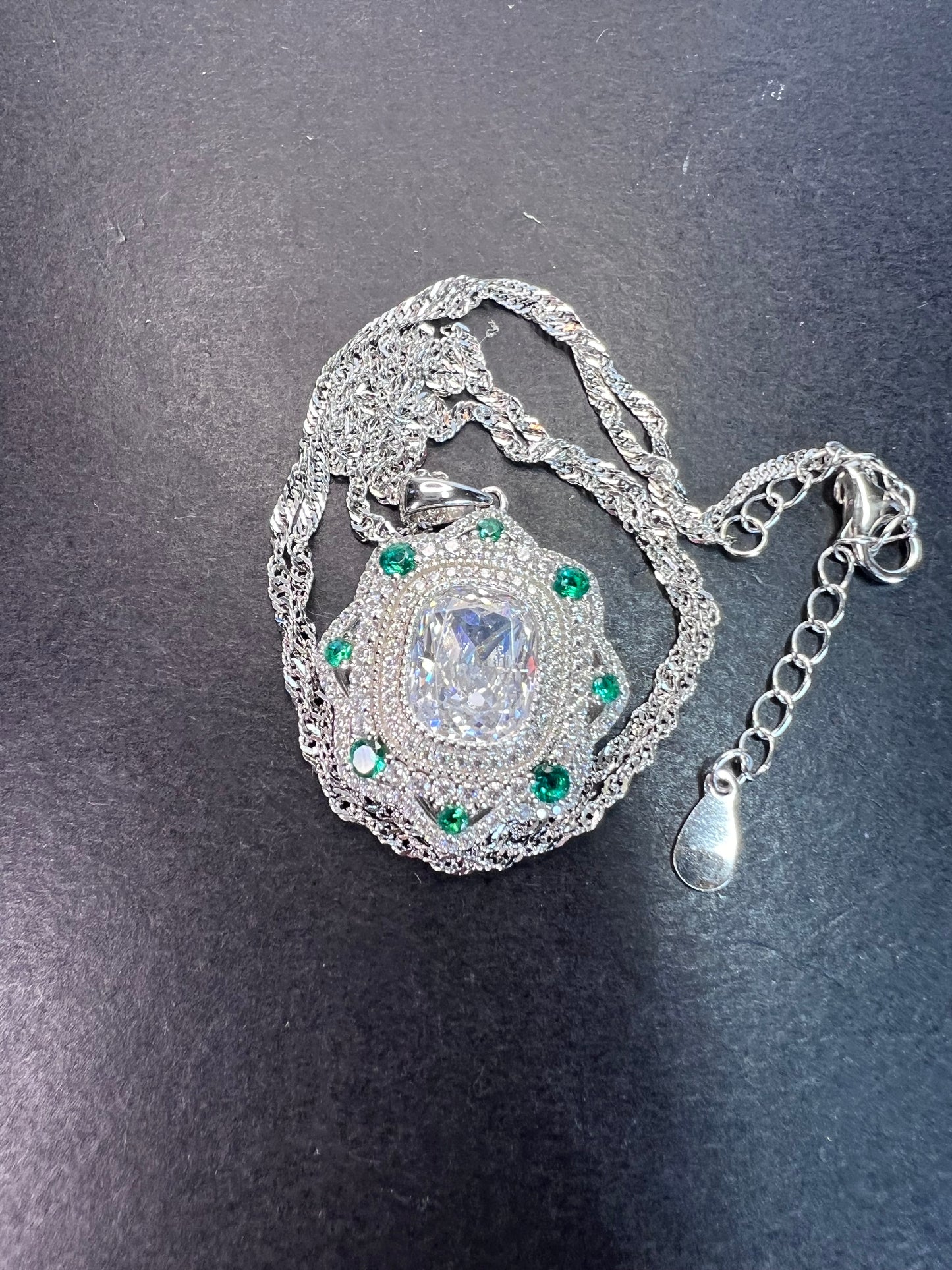 Bella Luce lab created green spinel and diamond simulant rhodium over sterling silver pendant with 18 inch chain necklace