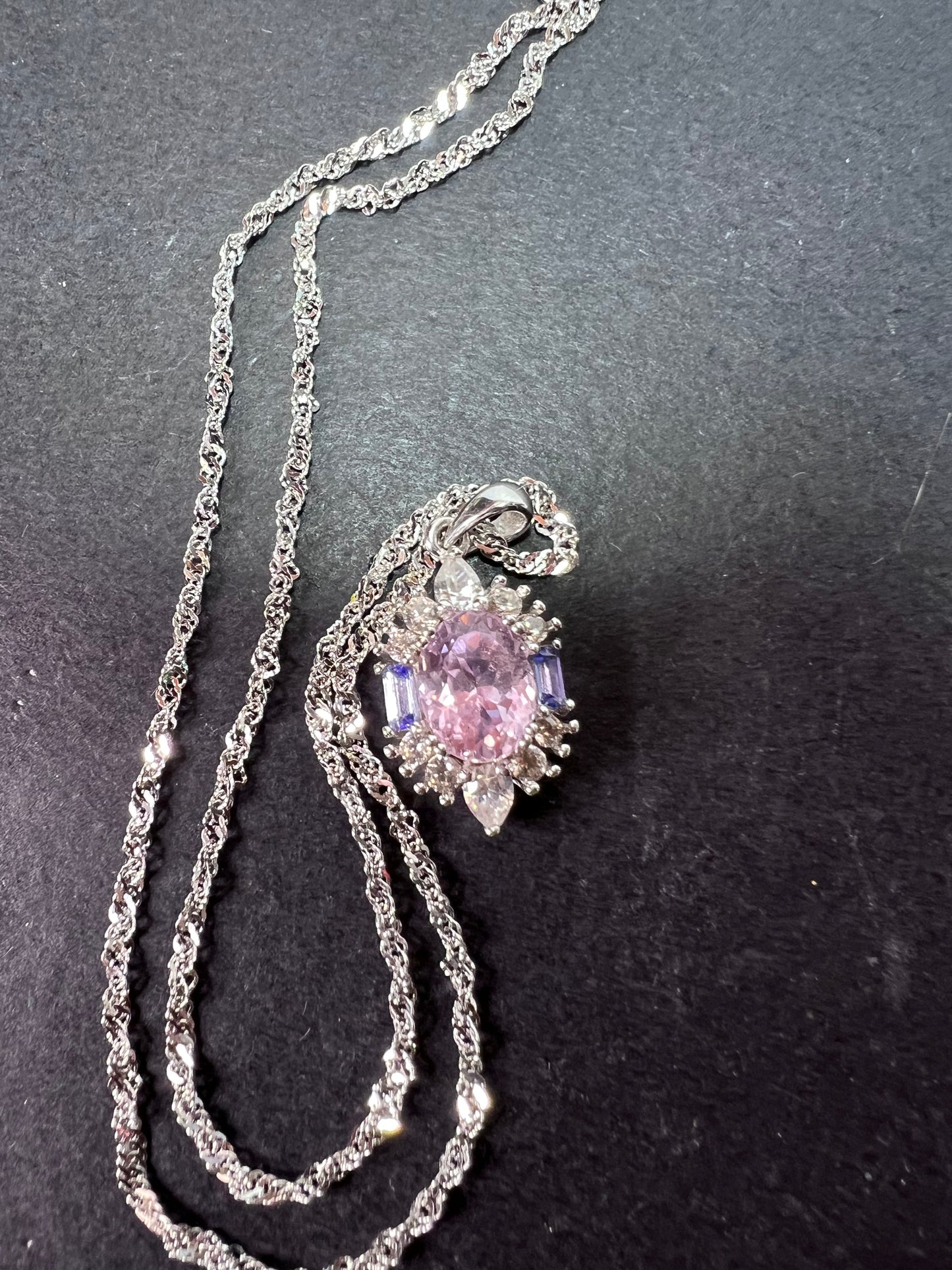 2.11ct Kunzite, 0.18ctw Tanzanite And 0.87ctw White Zircon Rhodium Over Silver halo Pendant With Chain