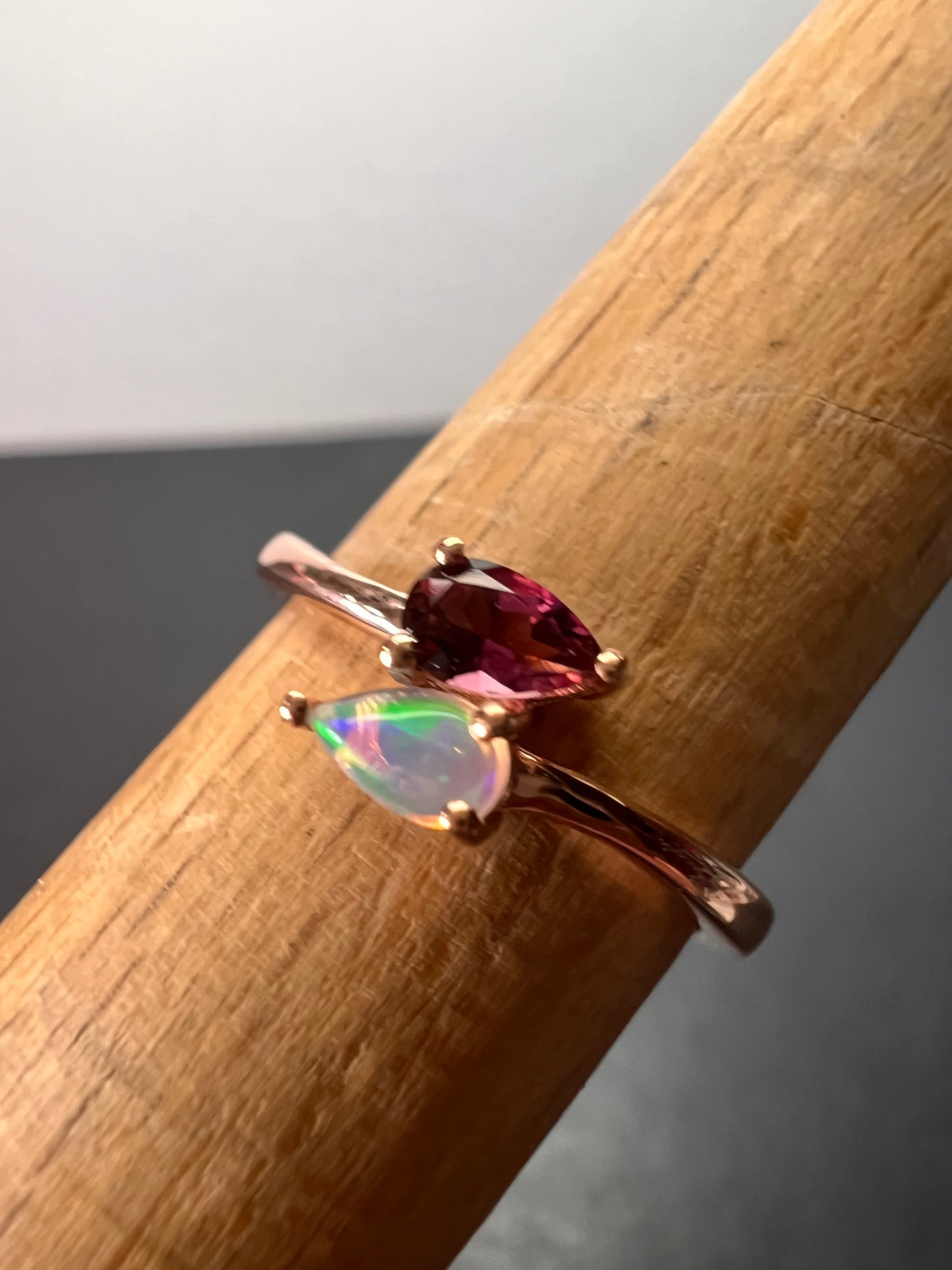 Rubellite and Ethiopian welo opal bypass ring in rose gold vermeil over sterling silver size 7. .35ctw