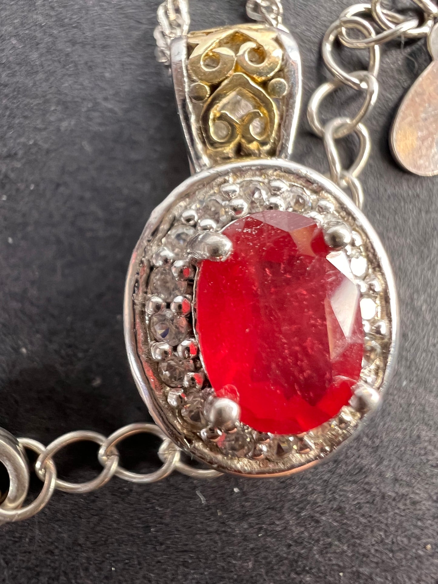 Ruby and zircon two toned halo pendant and chain necklace in sterling silver