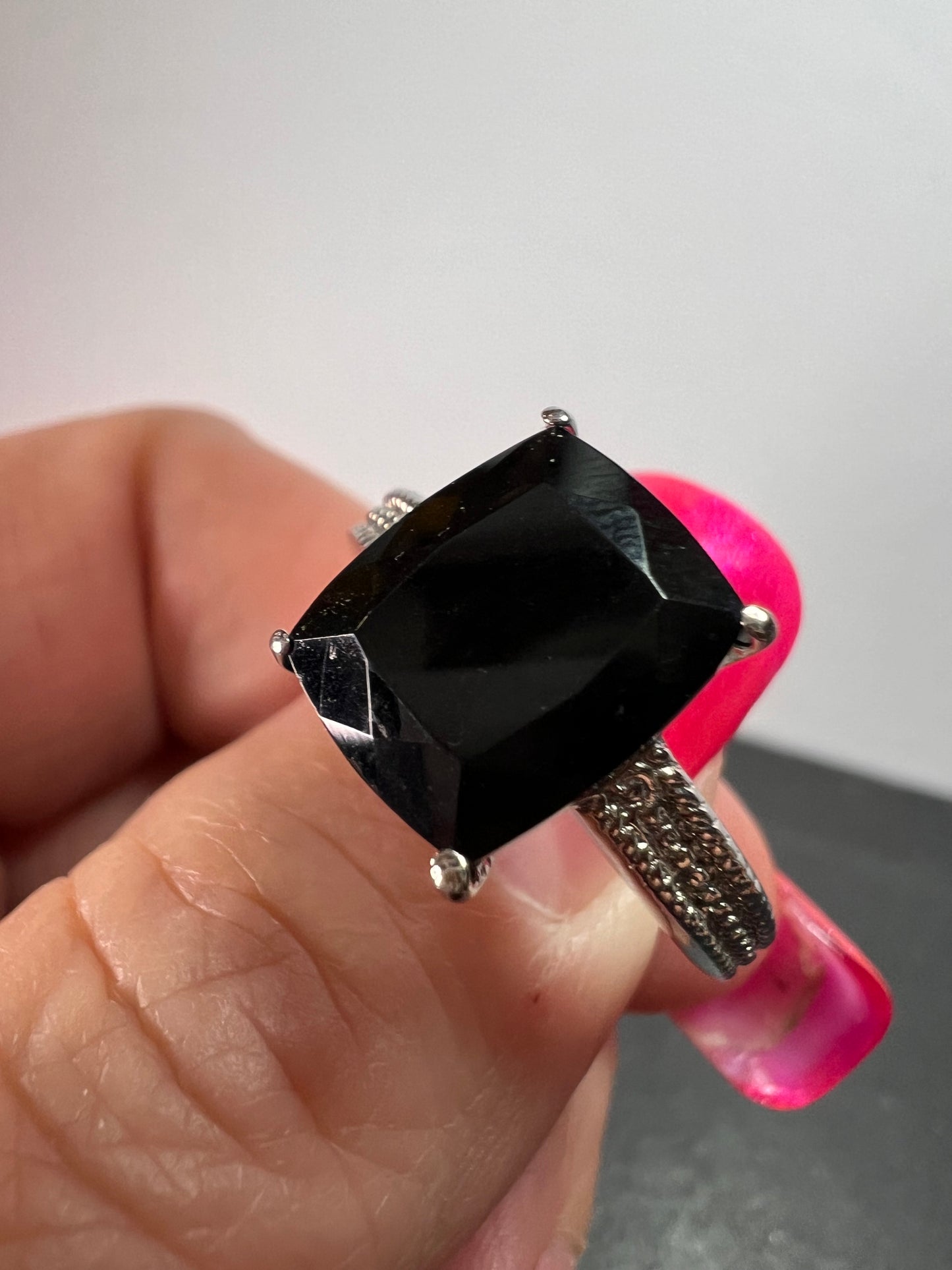 Black spinel in stainless steel ring size 9