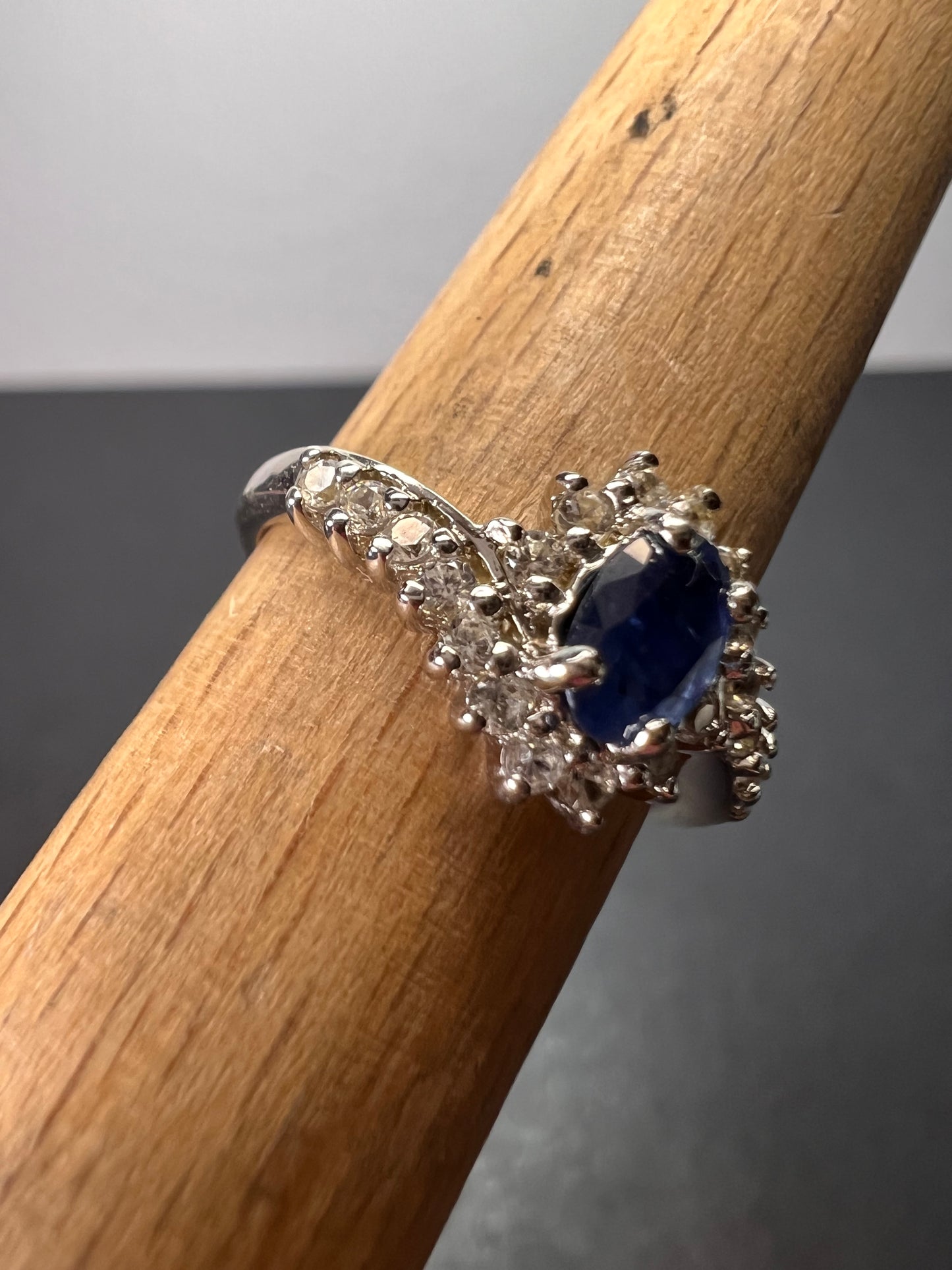 Blue sapphire and zircon floral ring in platinum over sterling silver size 5