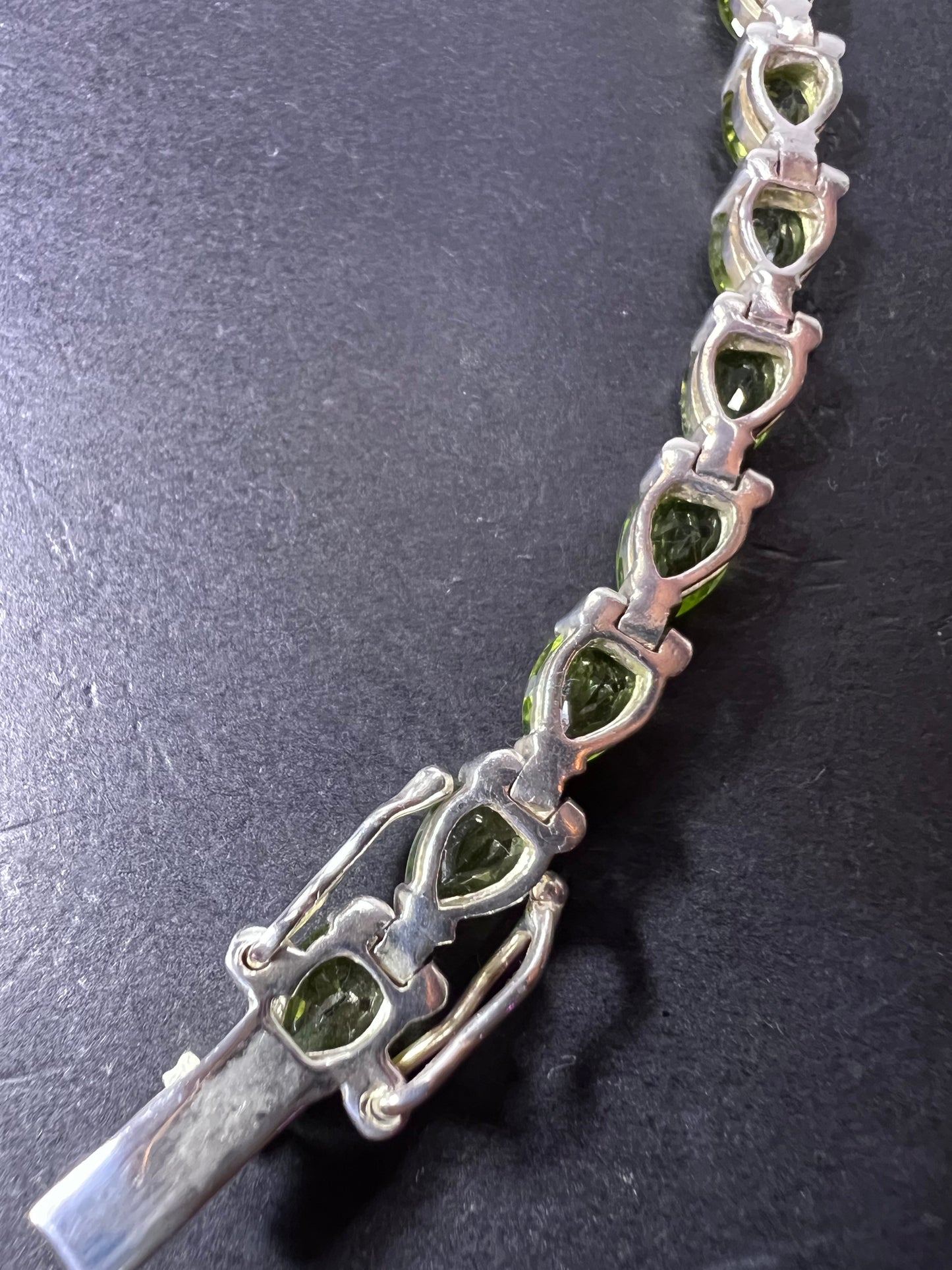 Peridot and sterling silver tennis bracelet