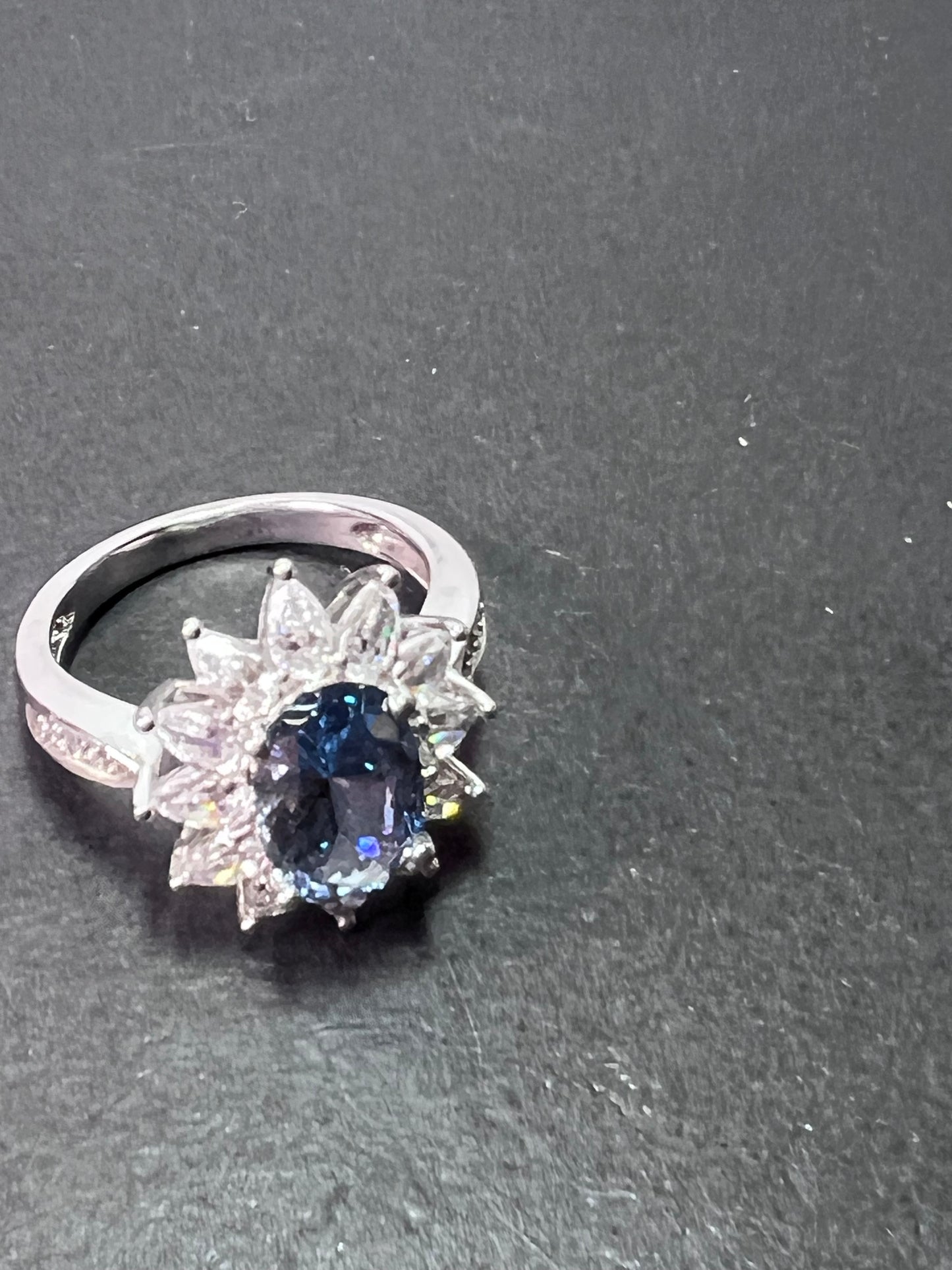 Blue lab spinel and white CZ rhodium over sterling ring size 10