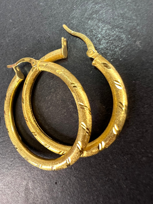 Satin finish diamond cut hoop earrings in yellow gold over sterling silver