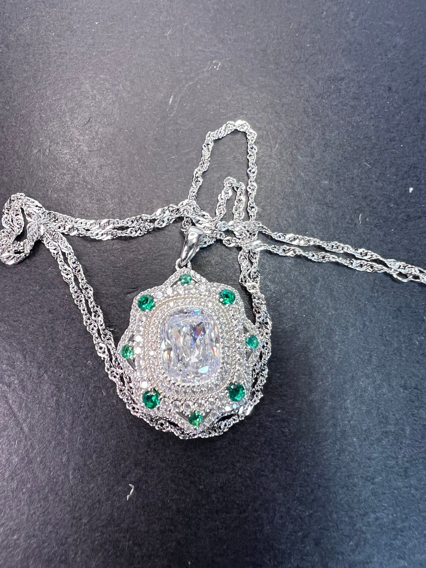 Bella Luce lab created green spinel and diamond simulant rhodium over sterling silver pendant with 18 inch chain necklace