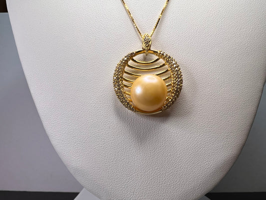 Golden yellow cultured pearl pendant in gold over sterling silver with chain