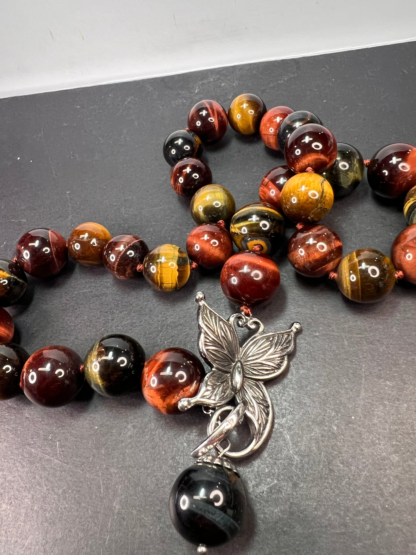 Multi tigers eye beaded knotted necklace with stainless steel toggle clasp