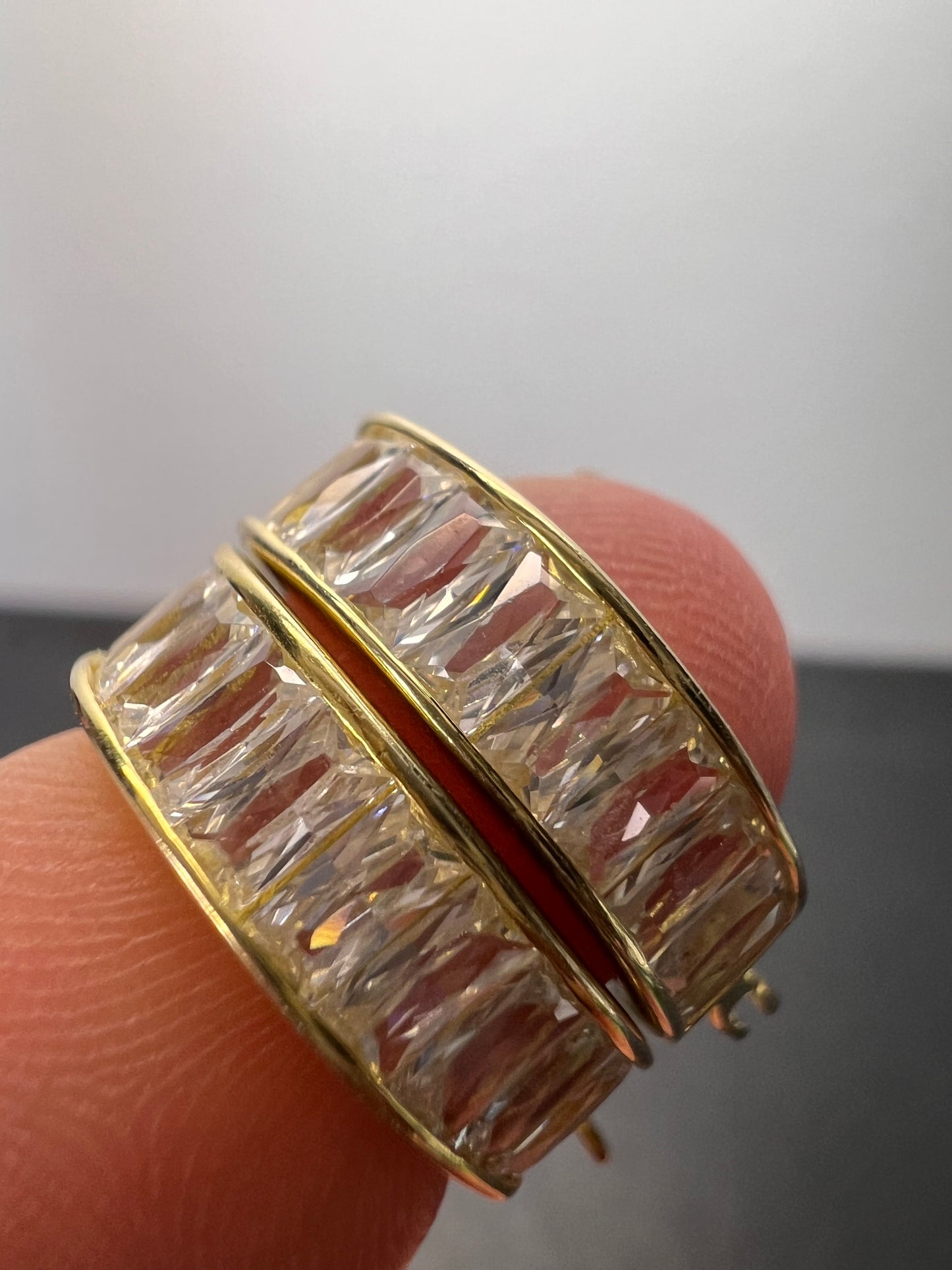 CZ huggie hoop earrings in yellow gold over sterling silver