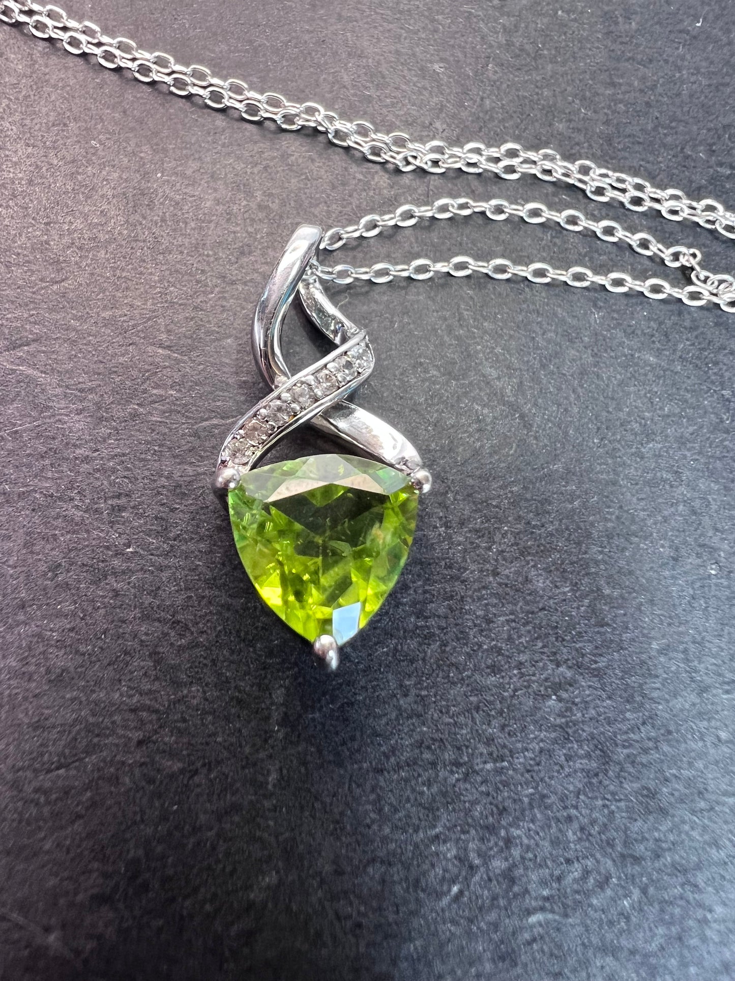 Trilliant cut peridot and sterling silver pendant and 18 inch chain