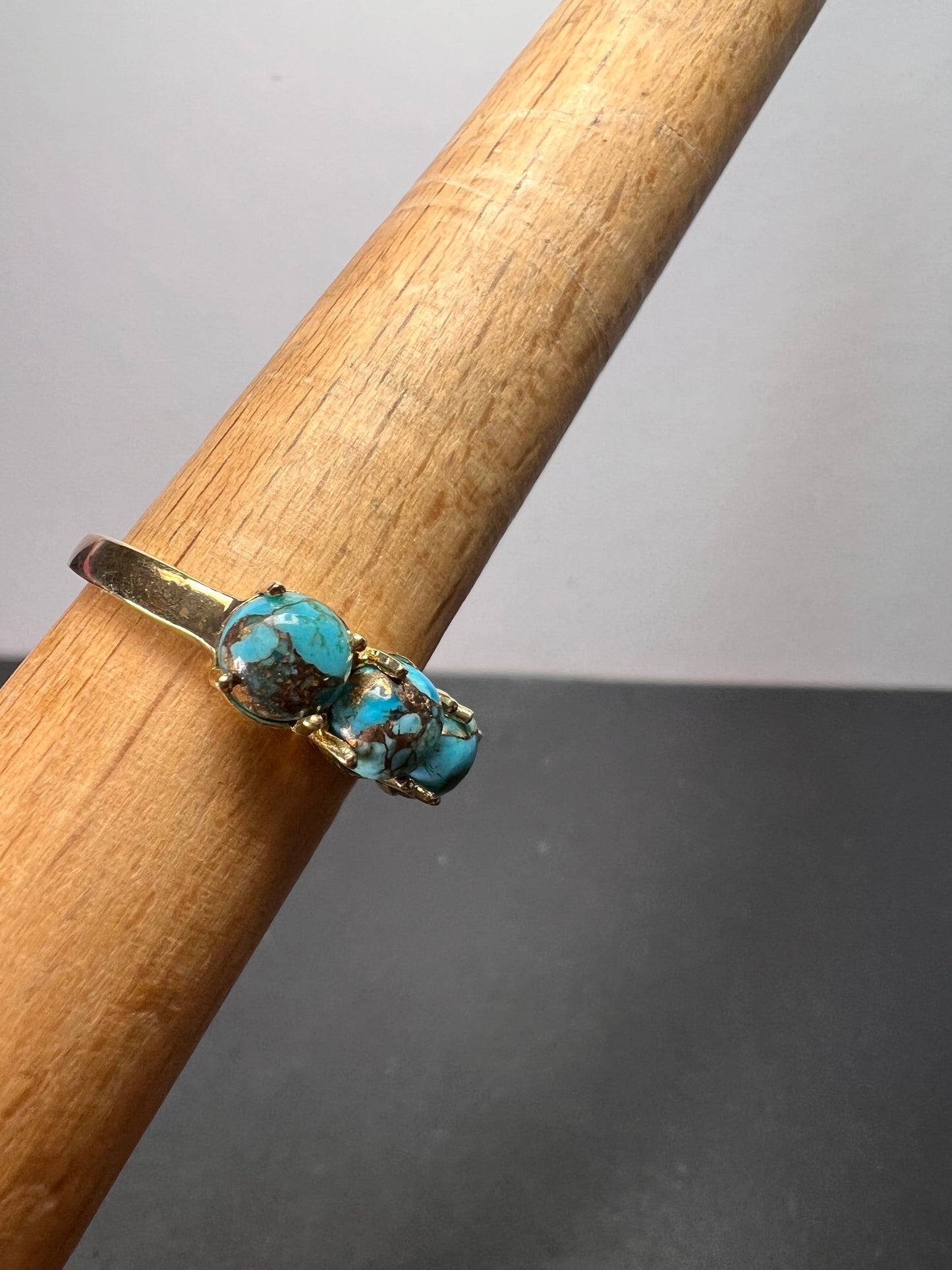 Blue composite turquoise trilogy ring in gold over sterling silver size 9