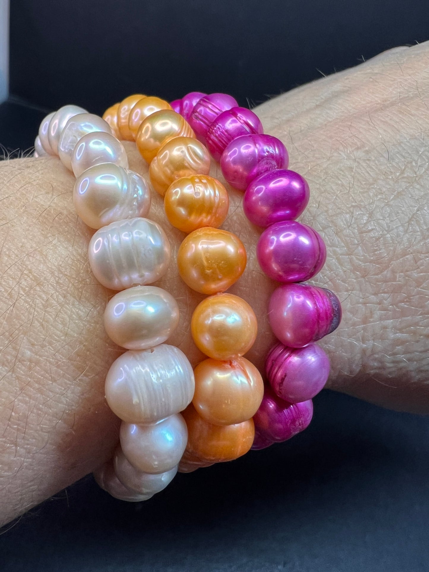 Set of three freshwater pearl stretch bracelets fuchsia pink to tangerine