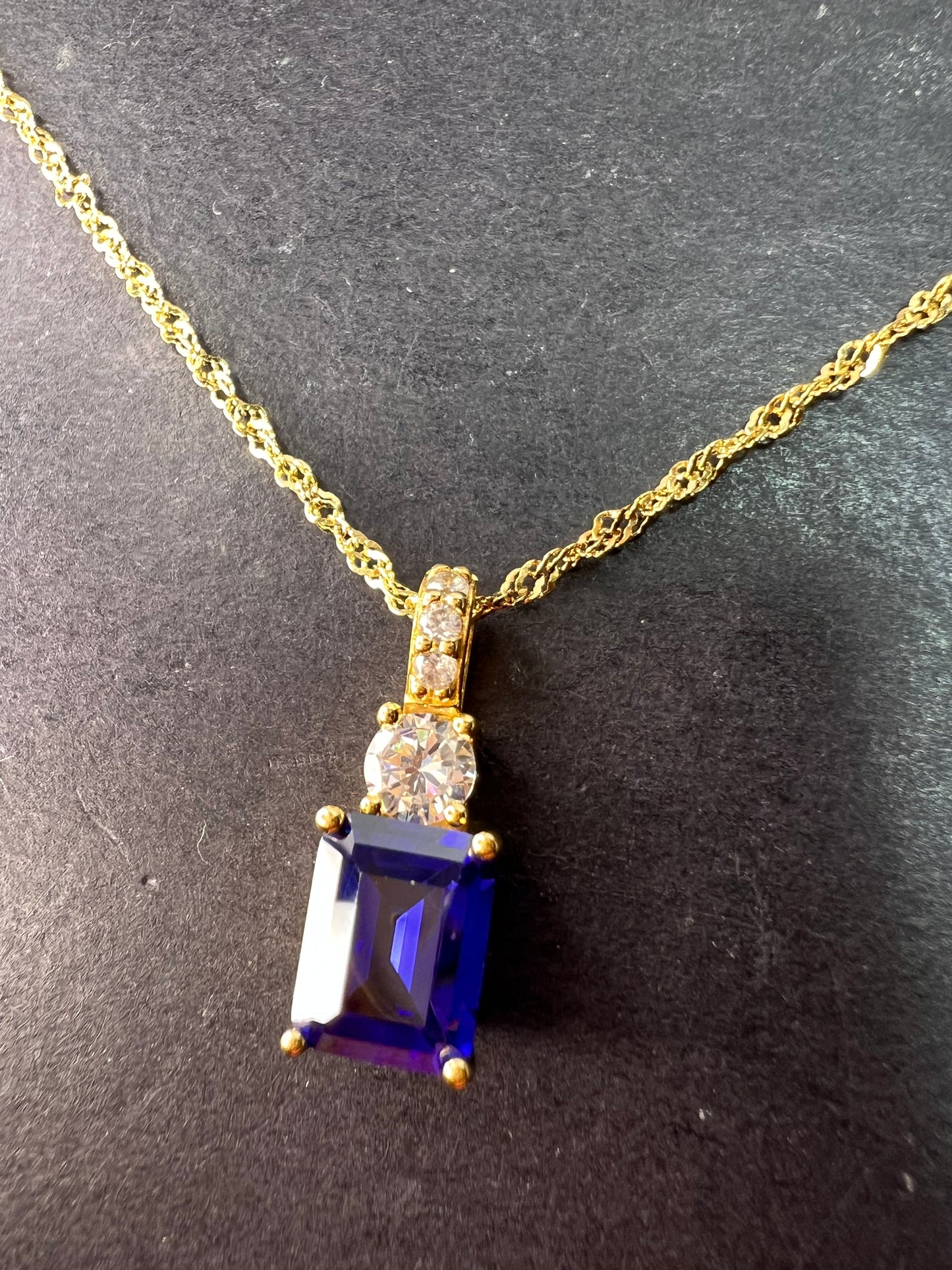 Blue emerald cut CZ pendant and chain necklace in gold over sterling silver 18 inches