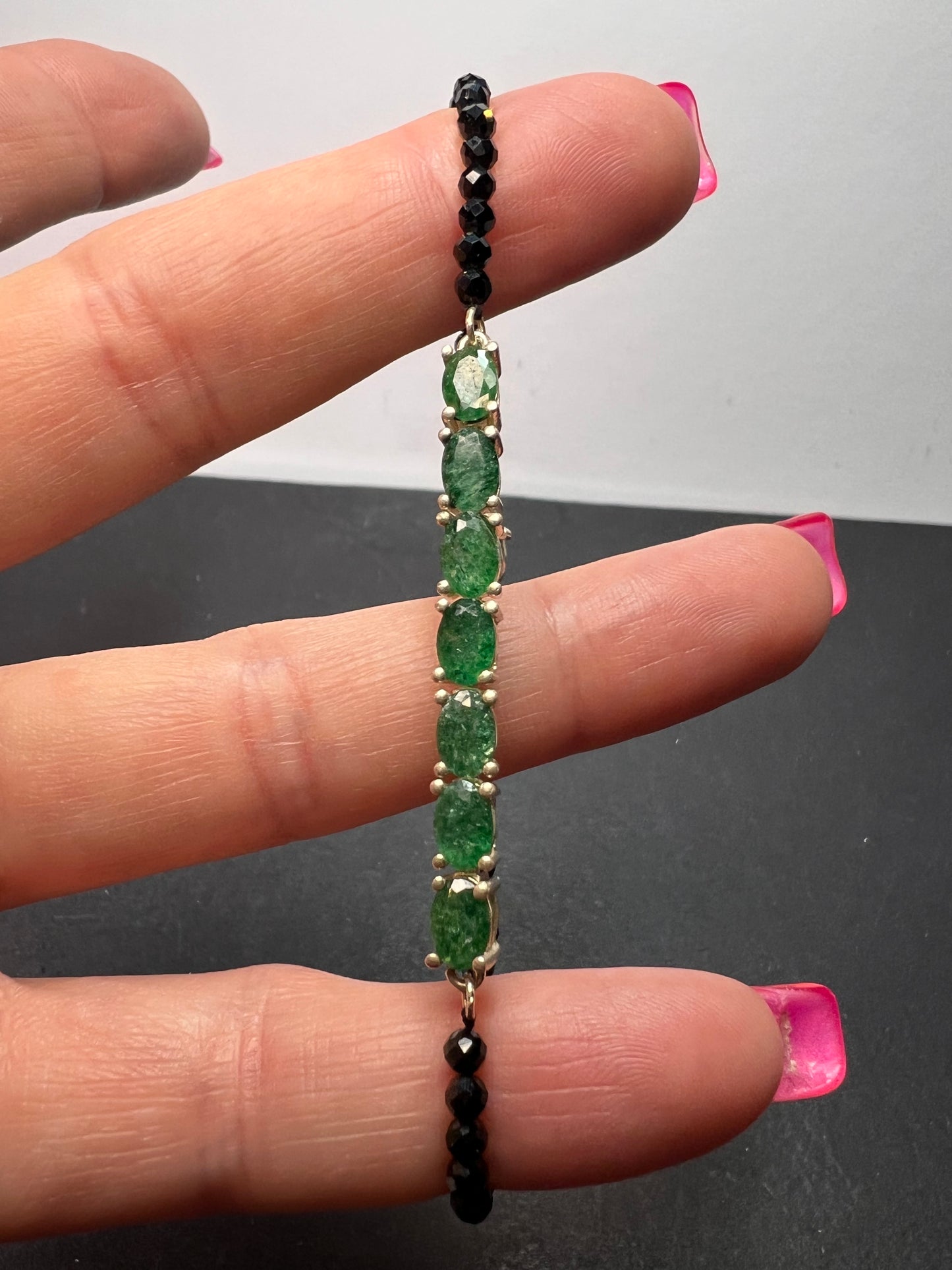 Black spinel and emerald sterling silver bracelet