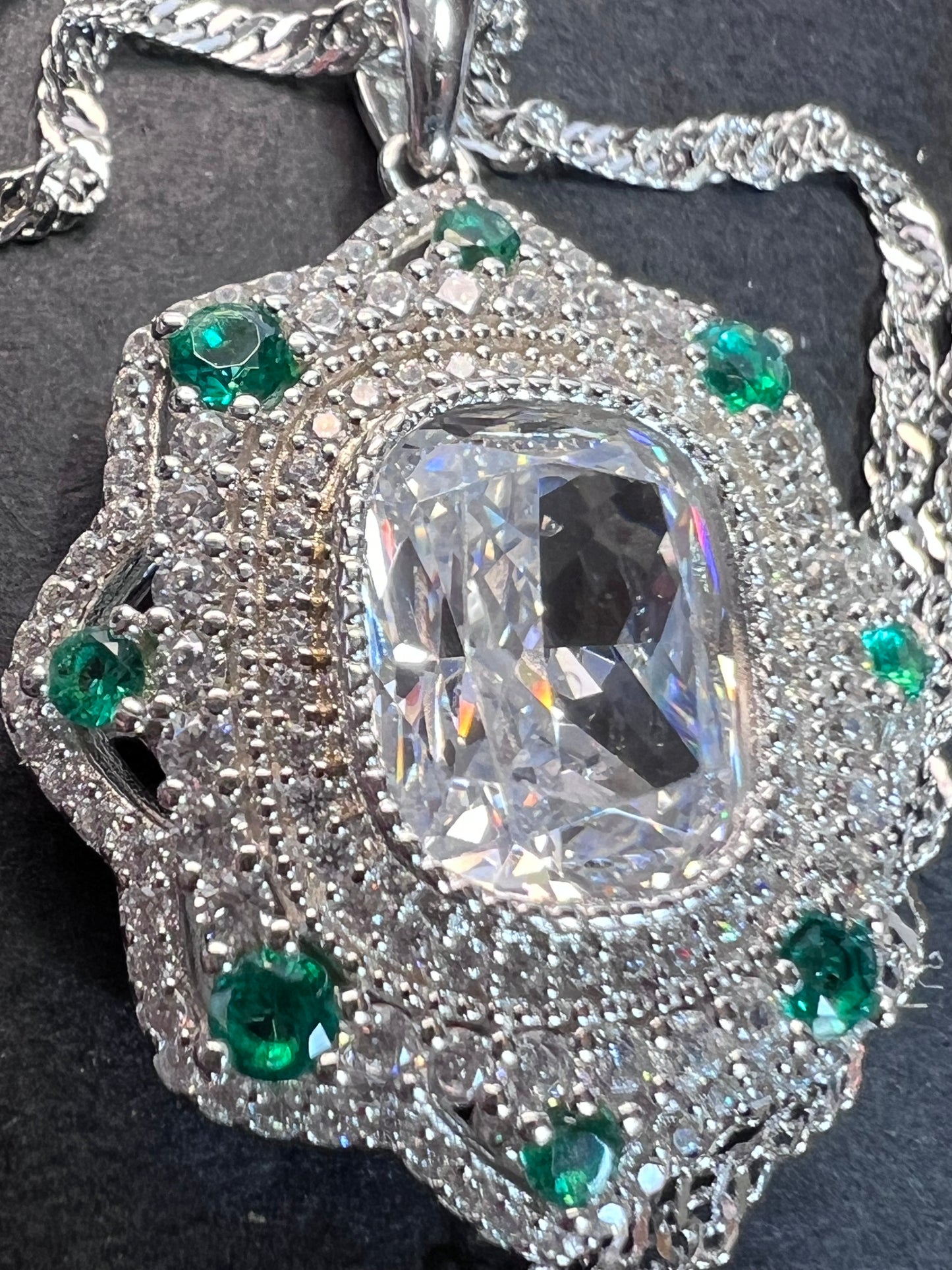 Bella Luce lab created green spinel and diamond simulant rhodium over sterling silver pendant with 18 inch chain necklace