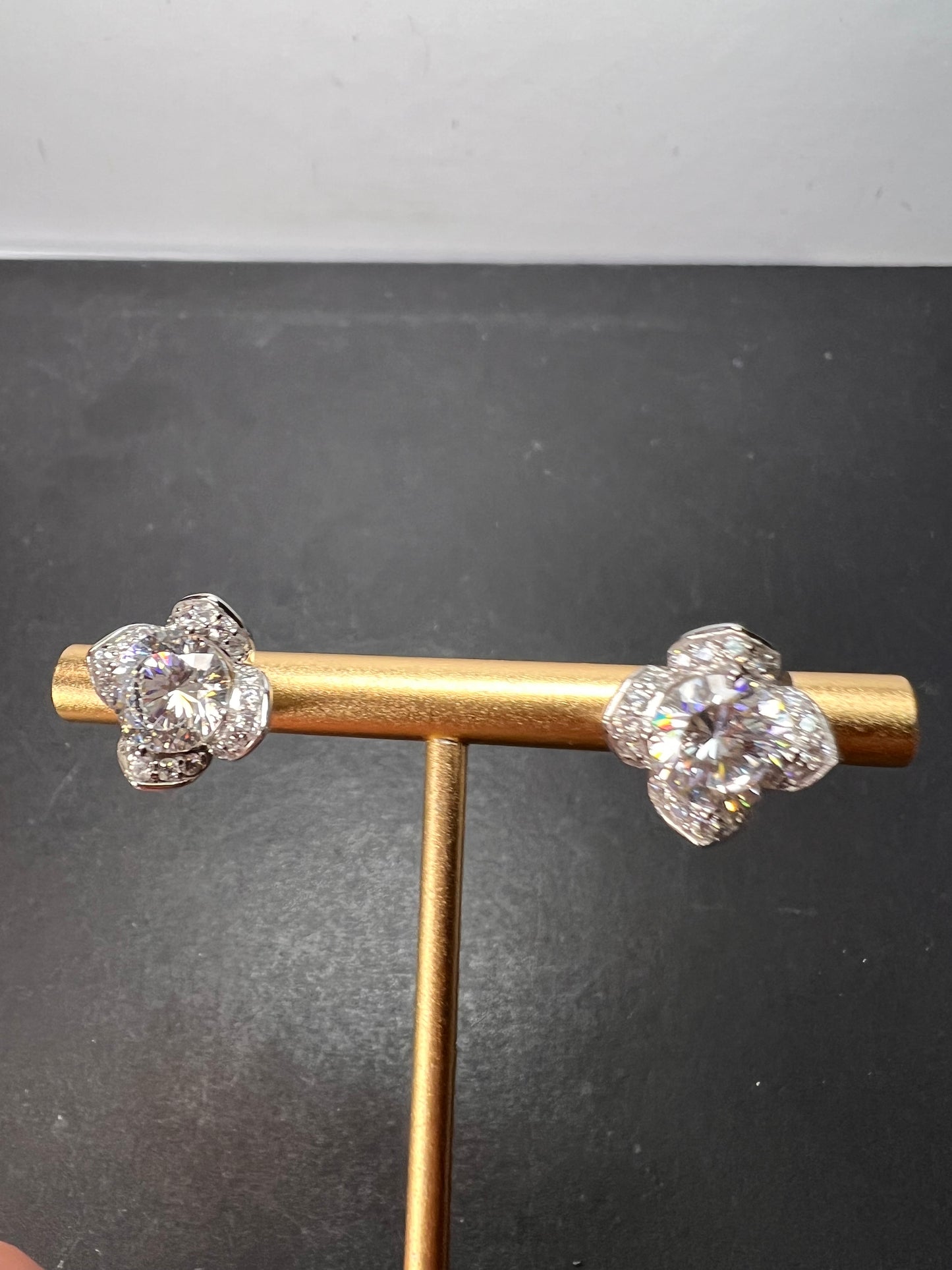 CZ floral styled stud earrings in rhodium over sterling silver