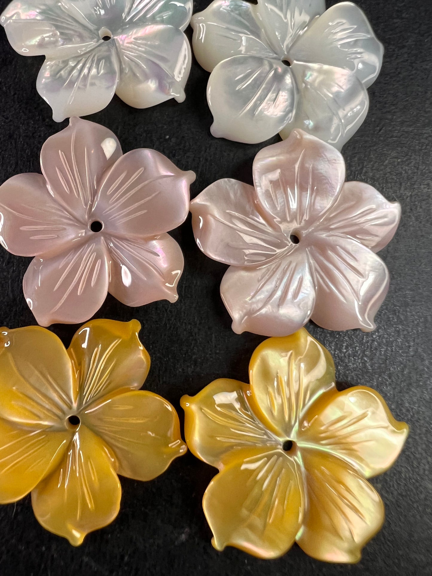 Vintage dead stock set of mother of pearl plumeria stud earrings in sterling silver