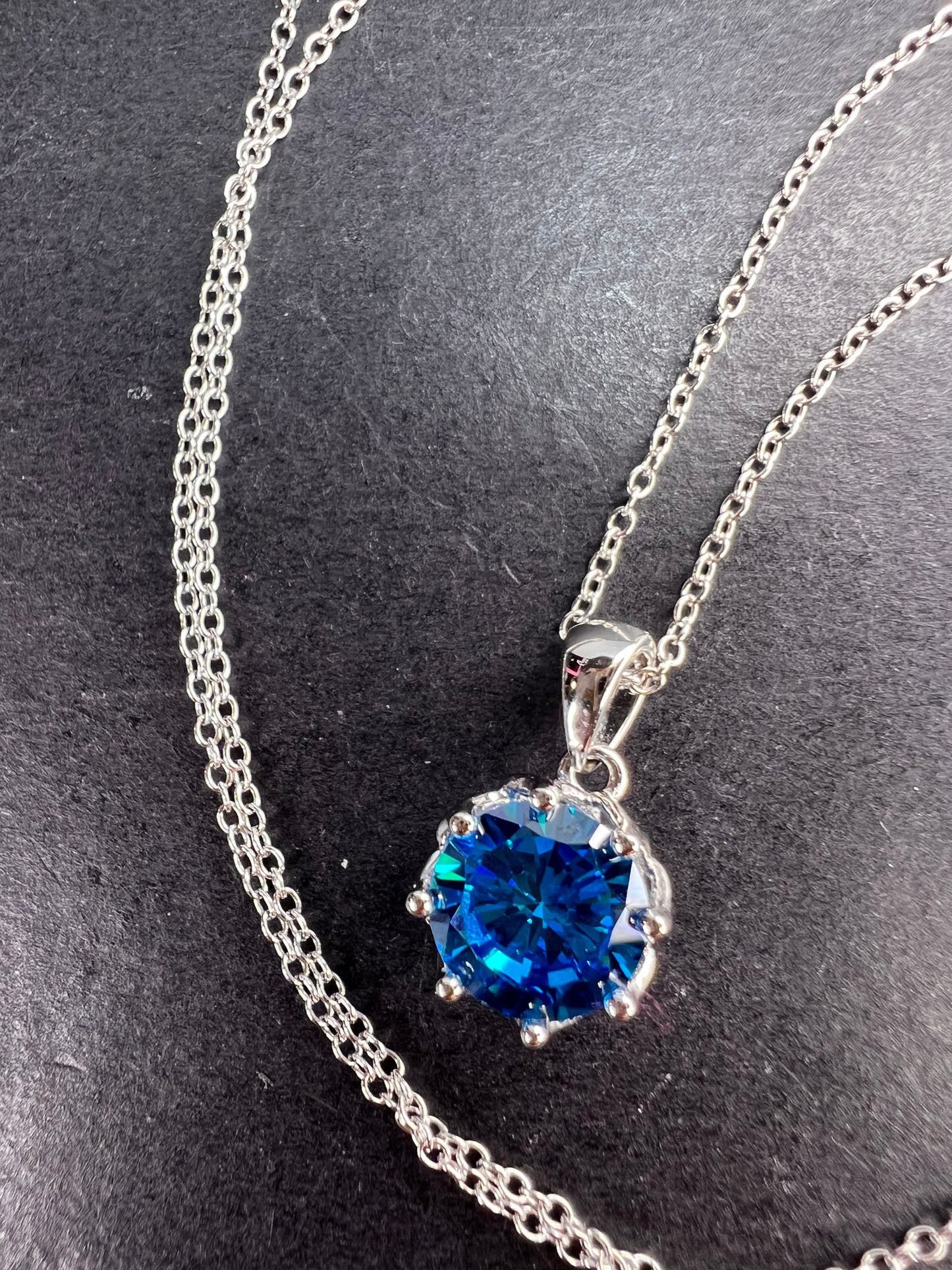 YGI blue CZ rhodium over sterling silver solitaire pendant and chain