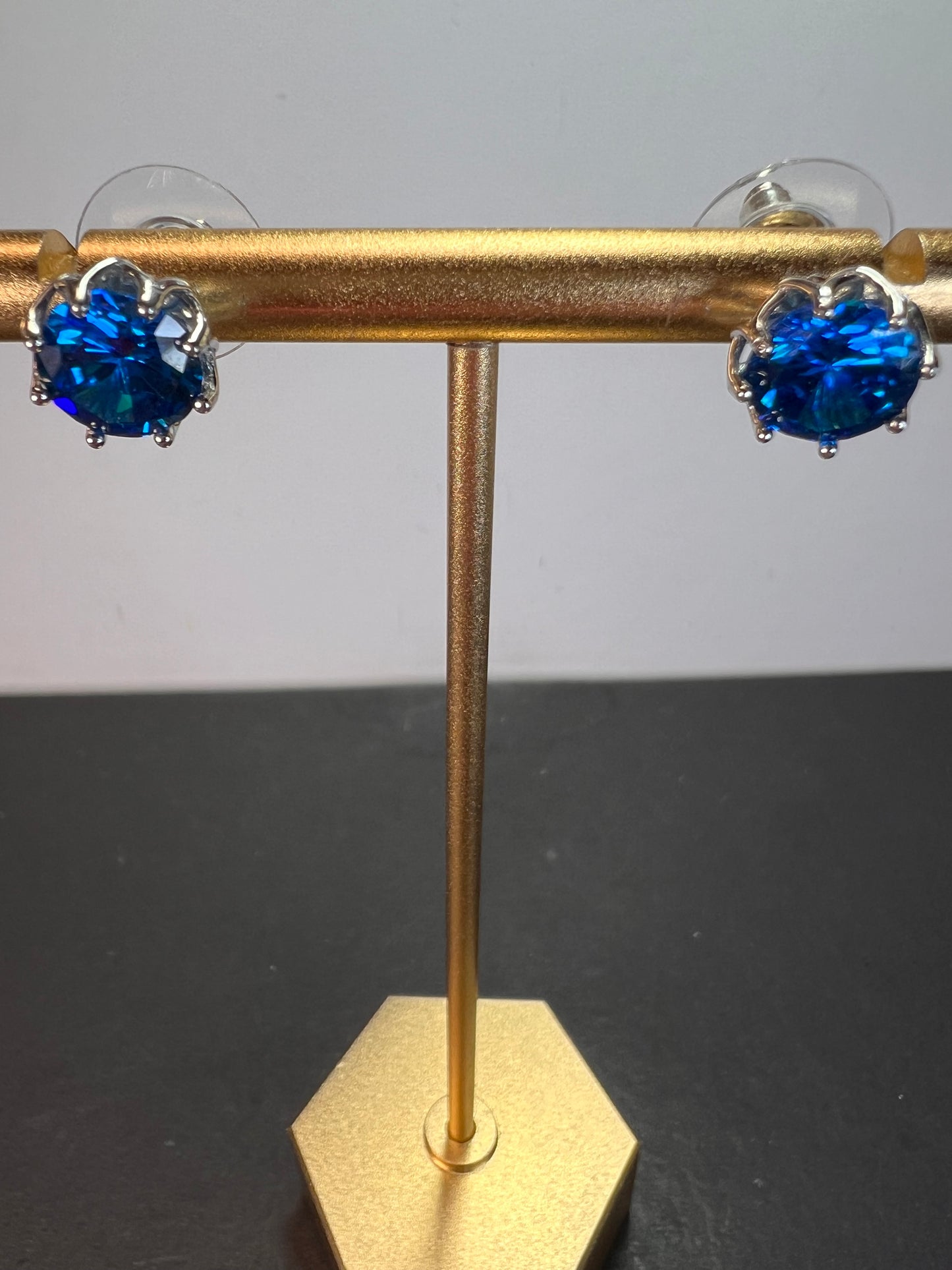 YGI blue CZ rhodium over sterling silver solitaire stud earrings