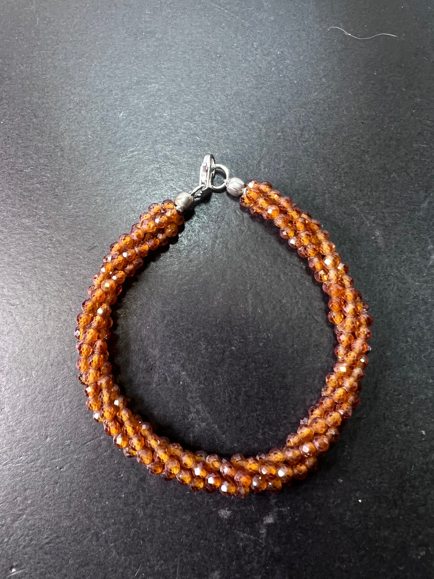 Hessonite garnet 4 strand bracelet with sterling clasp 7 inches