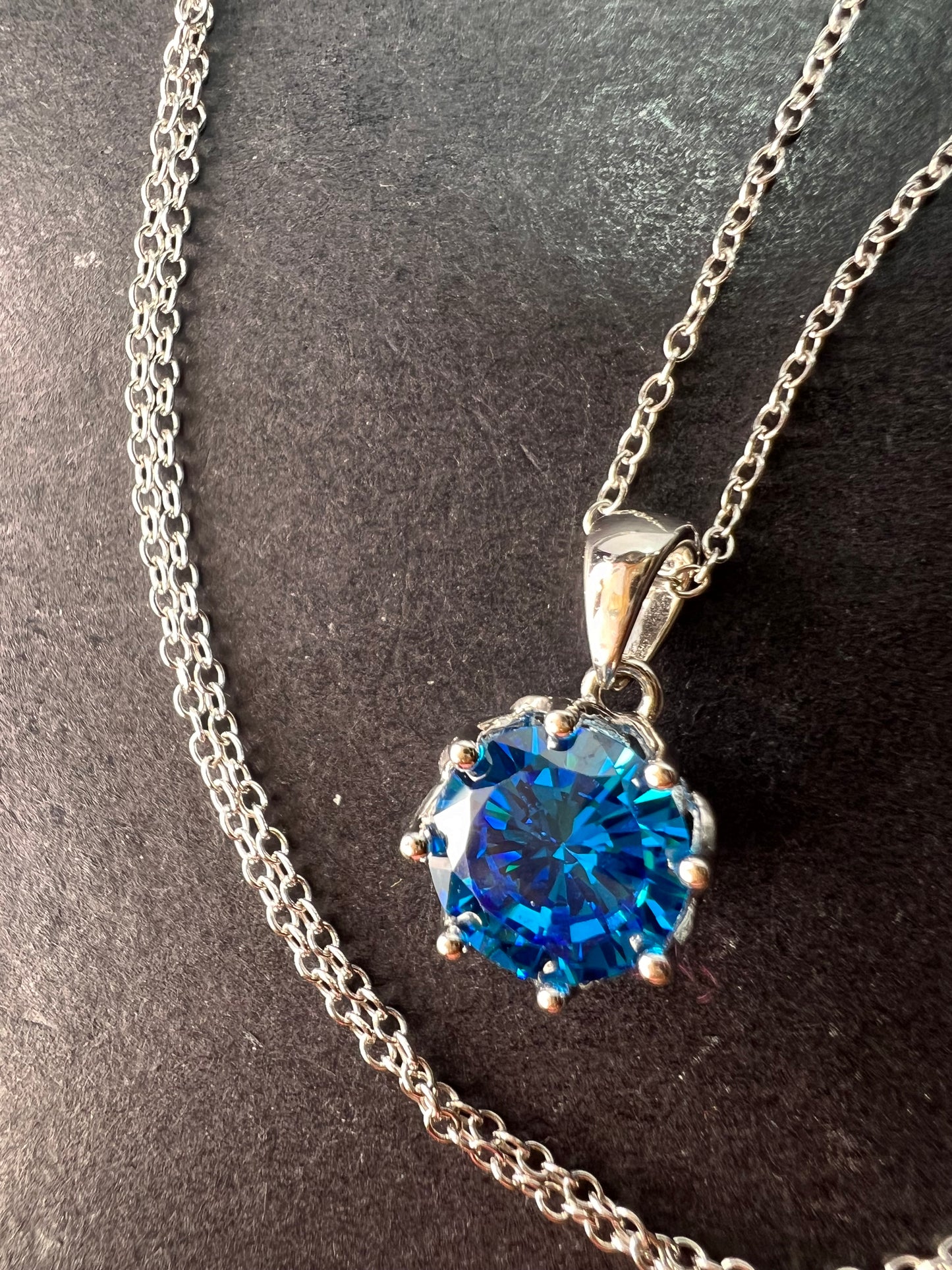 YGI blue CZ rhodium over sterling silver solitaire pendant and chain