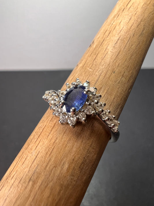 Blue sapphire and zircon floral ring in platinum over sterling silver size 5