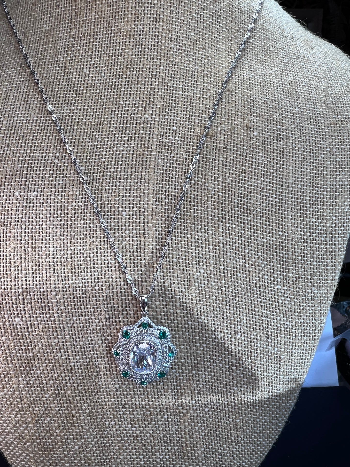 Bella Luce lab created green spinel and diamond simulant rhodium over sterling silver pendant with 18 inch chain necklace