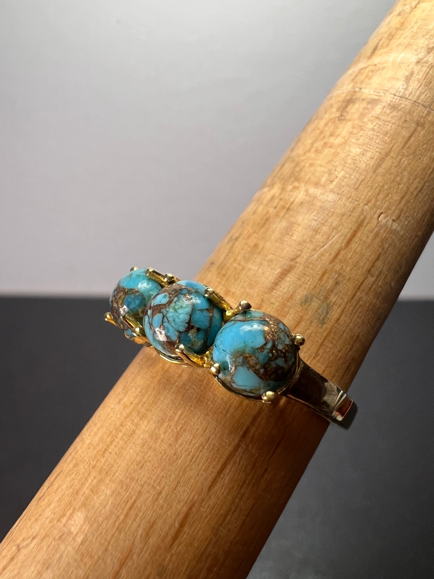 Blue composite turquoise trilogy ring in gold over sterling silver size 9