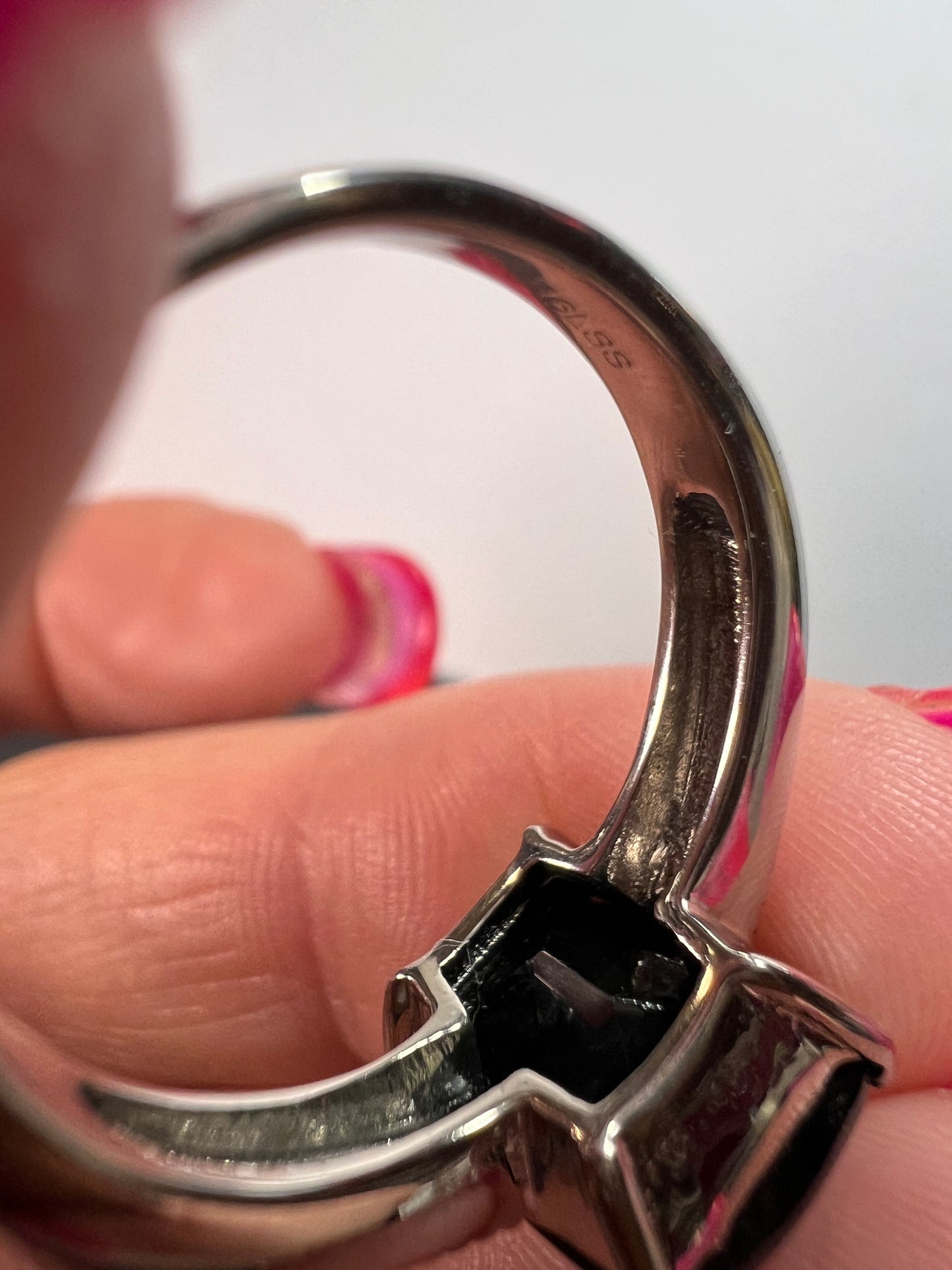 Black spinel in stainless steel ring size 9