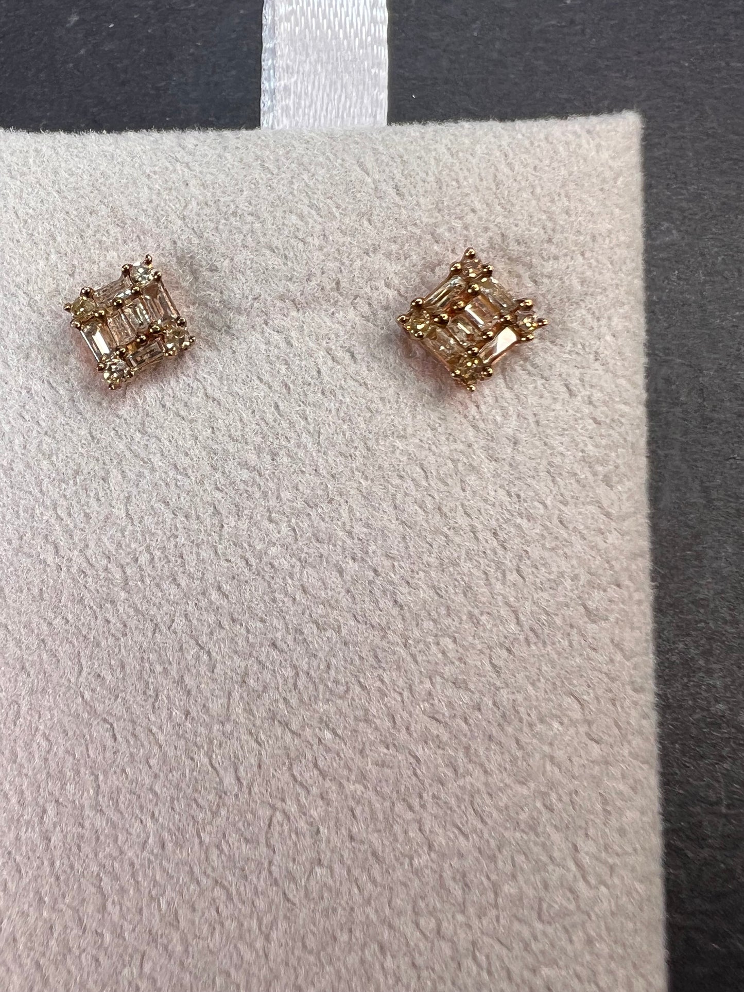 Diamond stud earrings in rose gold over sterling silver