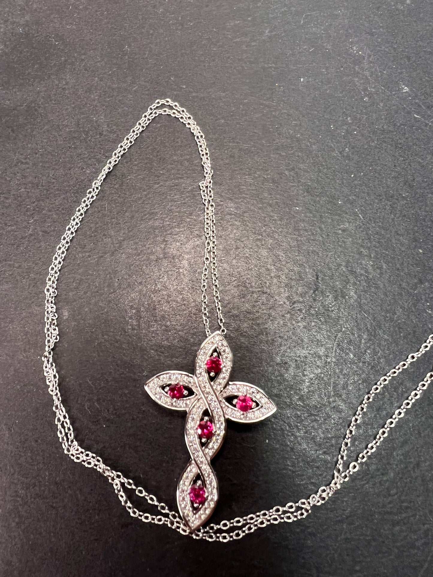 Lab grown ruby and CZ cross pendant and chain necklace in rhodium over sterling silver 18 inch