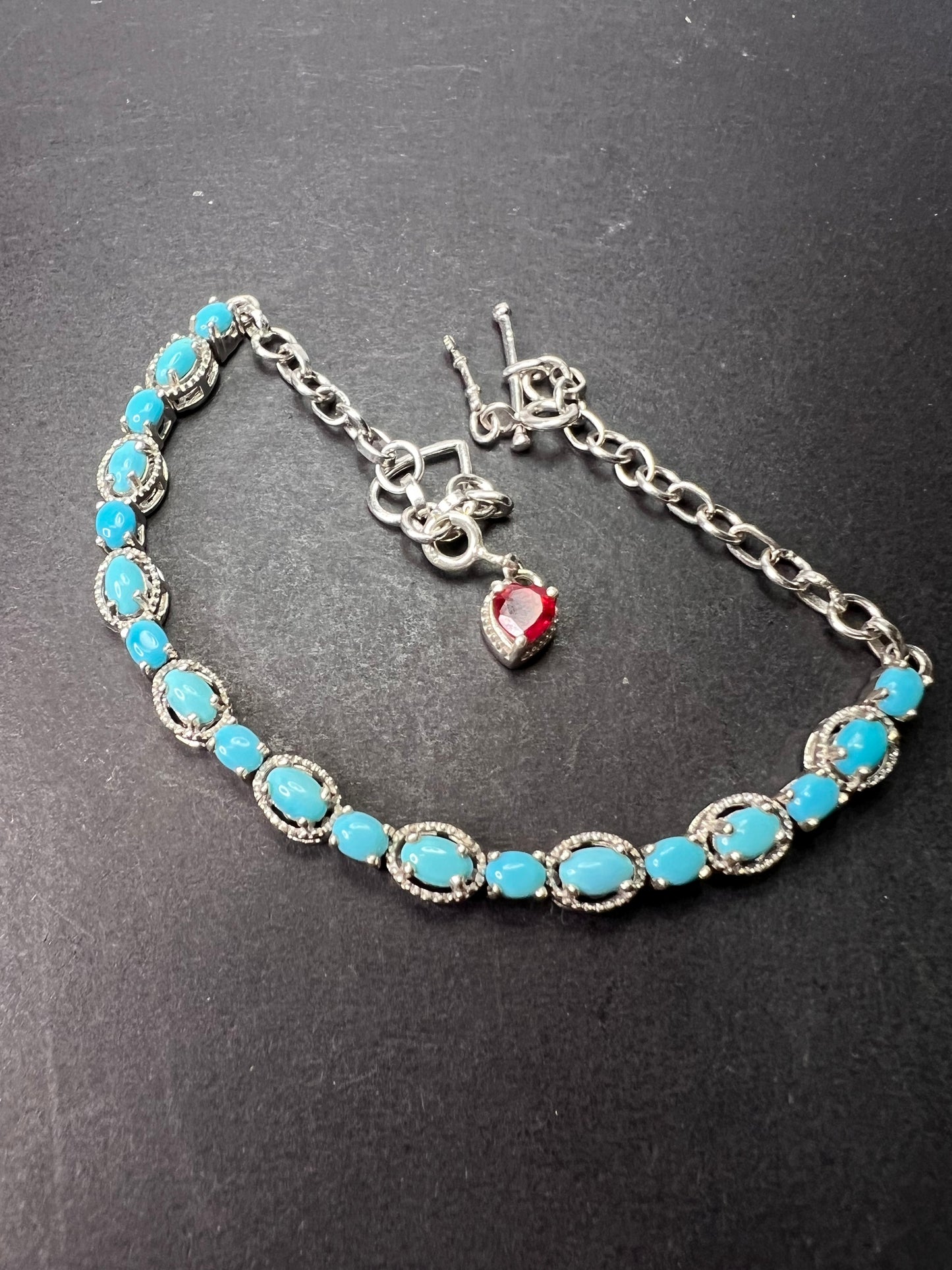 Sleeping Beauty turquoise sterling silver key and heart charm bracelet with toggle clasp and ruby