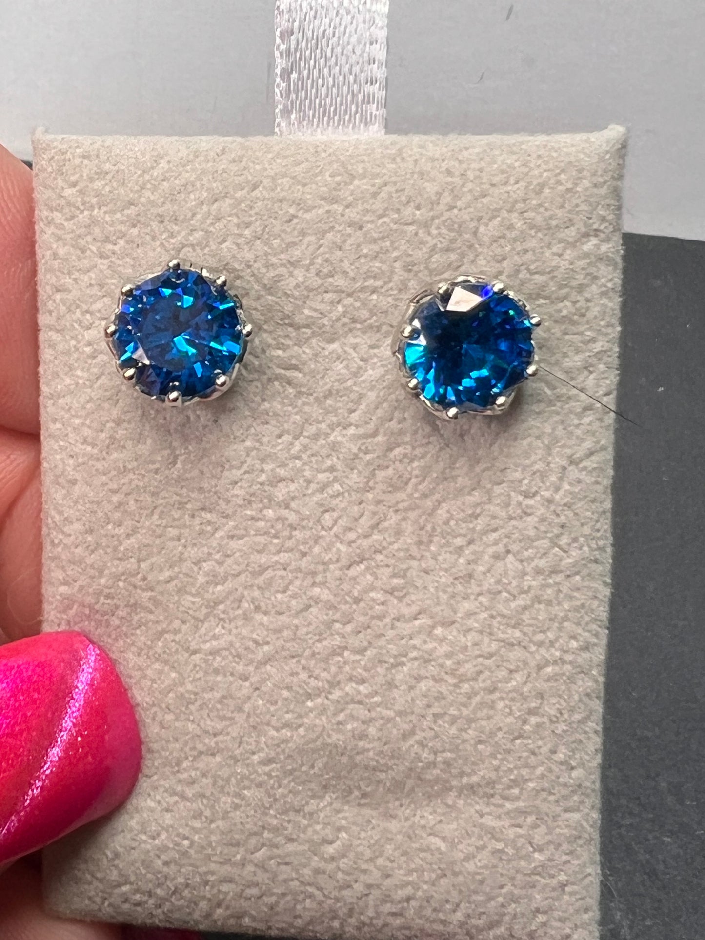 YGI blue CZ rhodium over sterling silver solitaire stud earrings