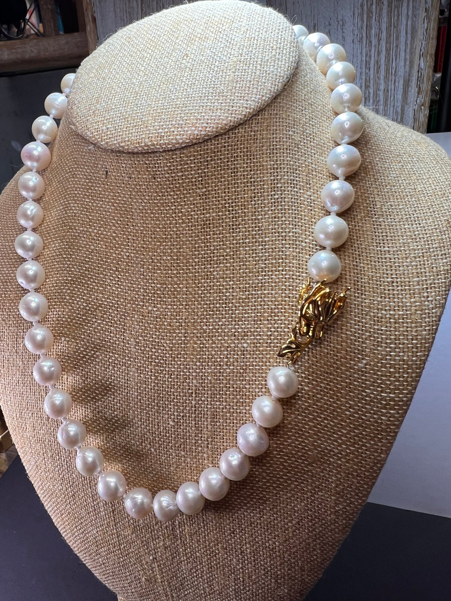 10-11mm white cultured pearl necklace with gold over sterling silver wolf head clasp 20 inch