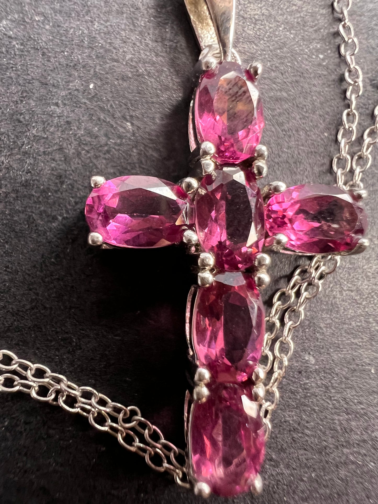 Raspberry rhodolite garnet cross pendant and chain necklace in sterling silver