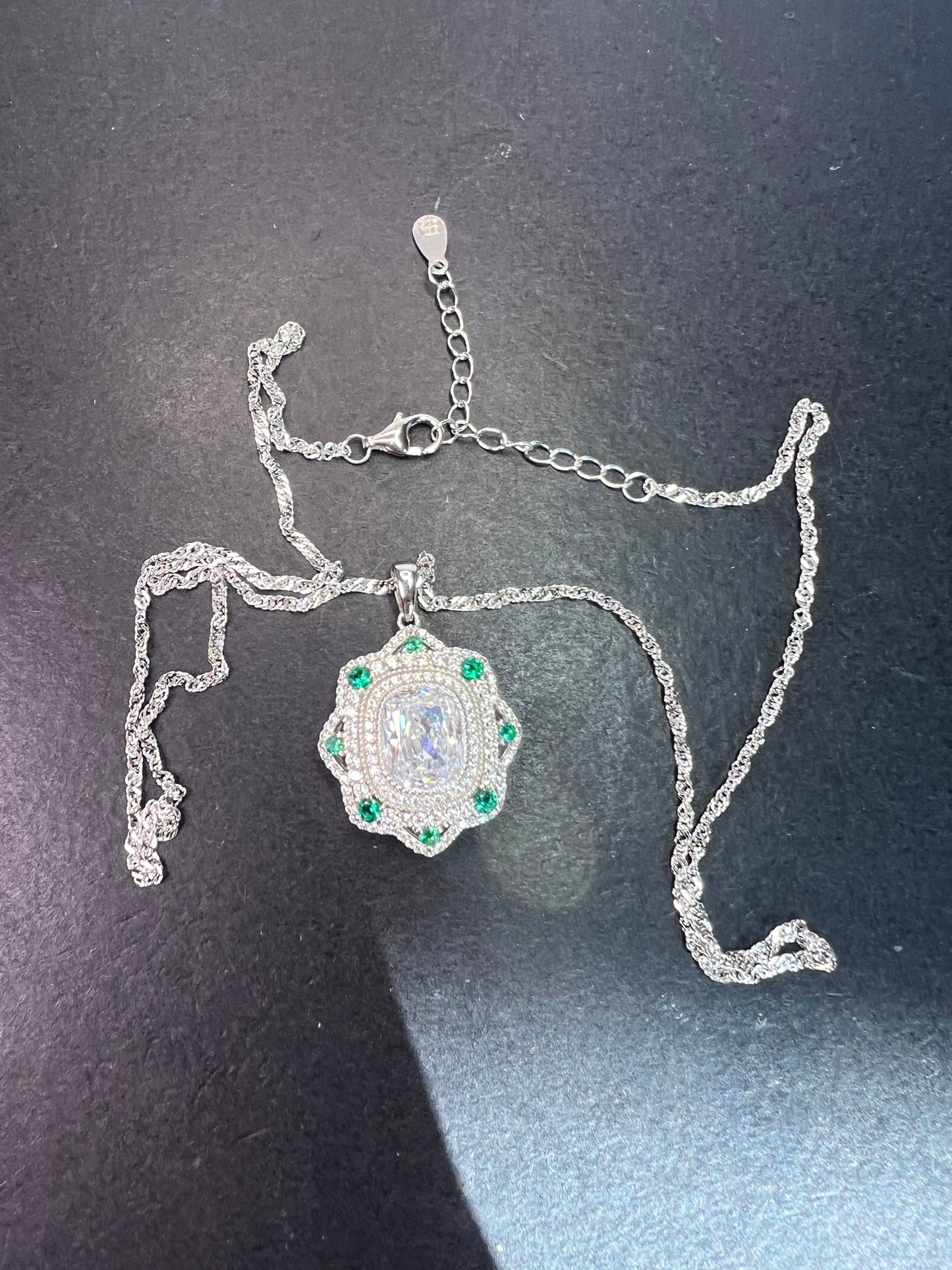 Bella Luce lab created green spinel and diamond simulant rhodium over sterling silver pendant with 18 inch chain necklace